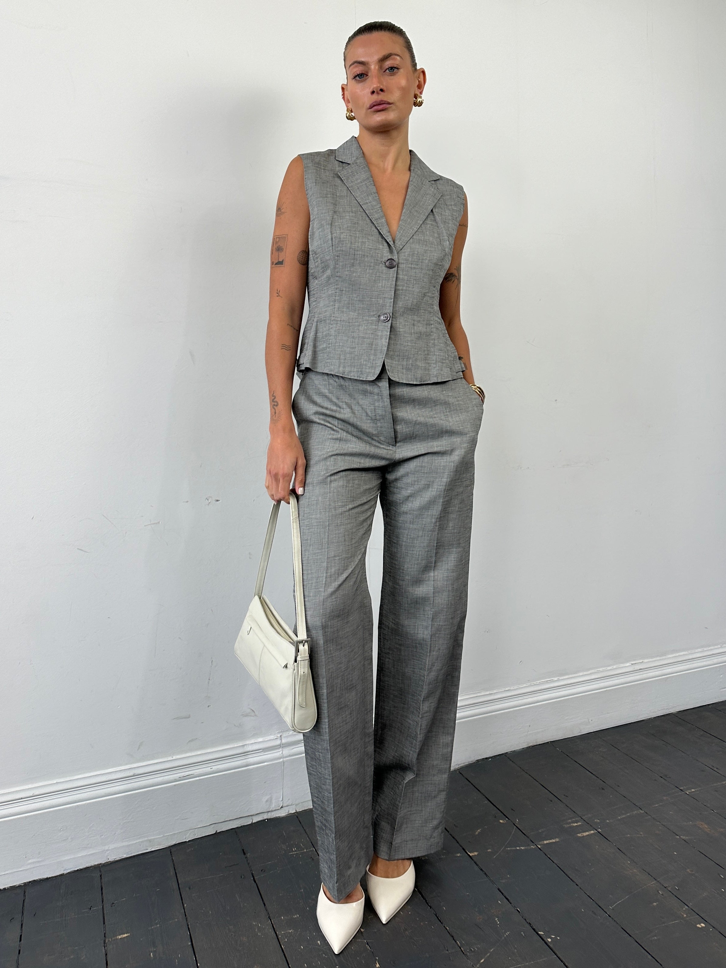 Max Mara linen cotton two-piece waistcoat and trousers co-ord set, featuring tailored fit and neutral fabric for a sophisticated look.