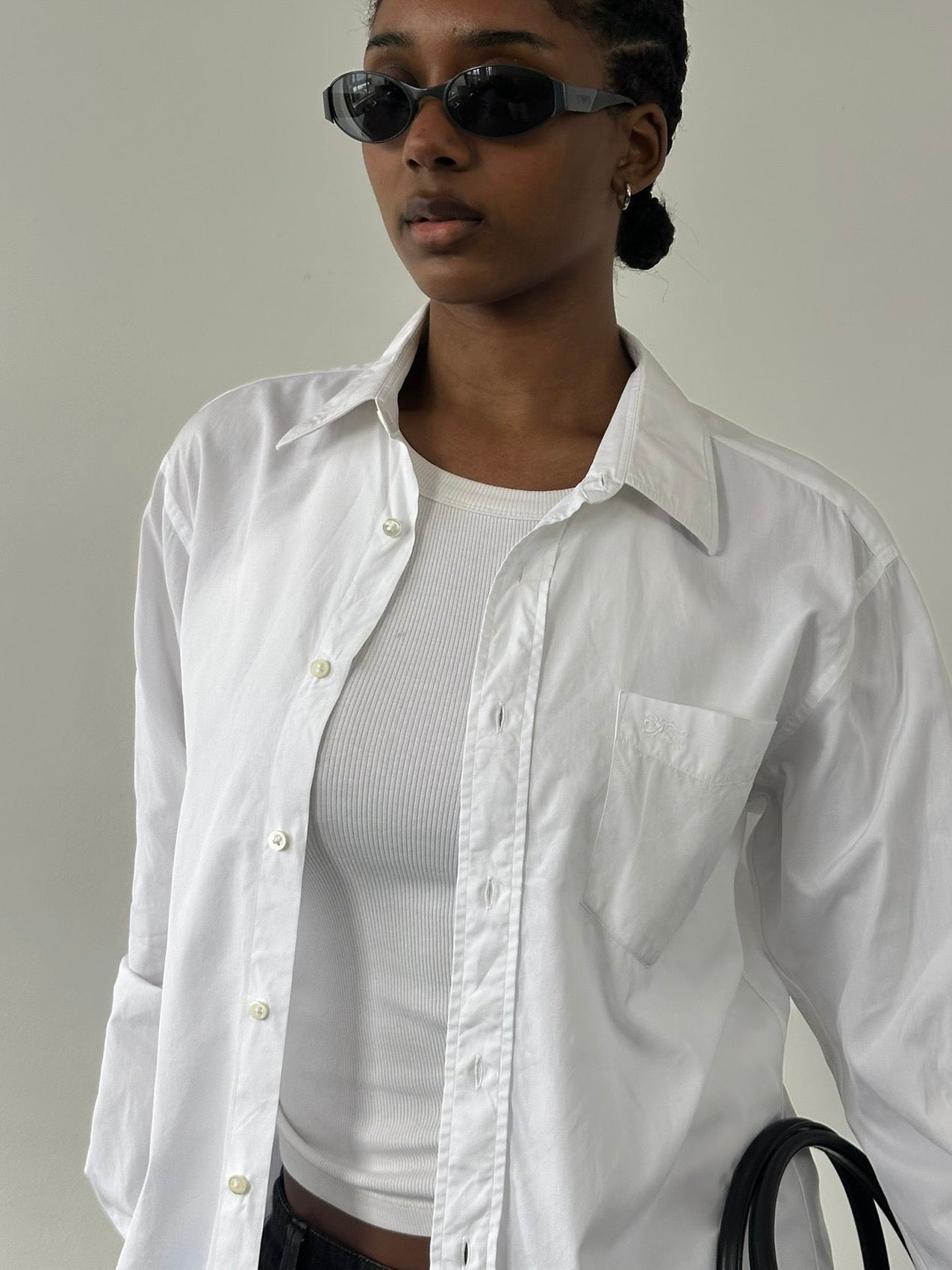 Burberry London 2000s cotton logo shirt in size M/L, featuring the classic Burberry check pattern and branding on the front.