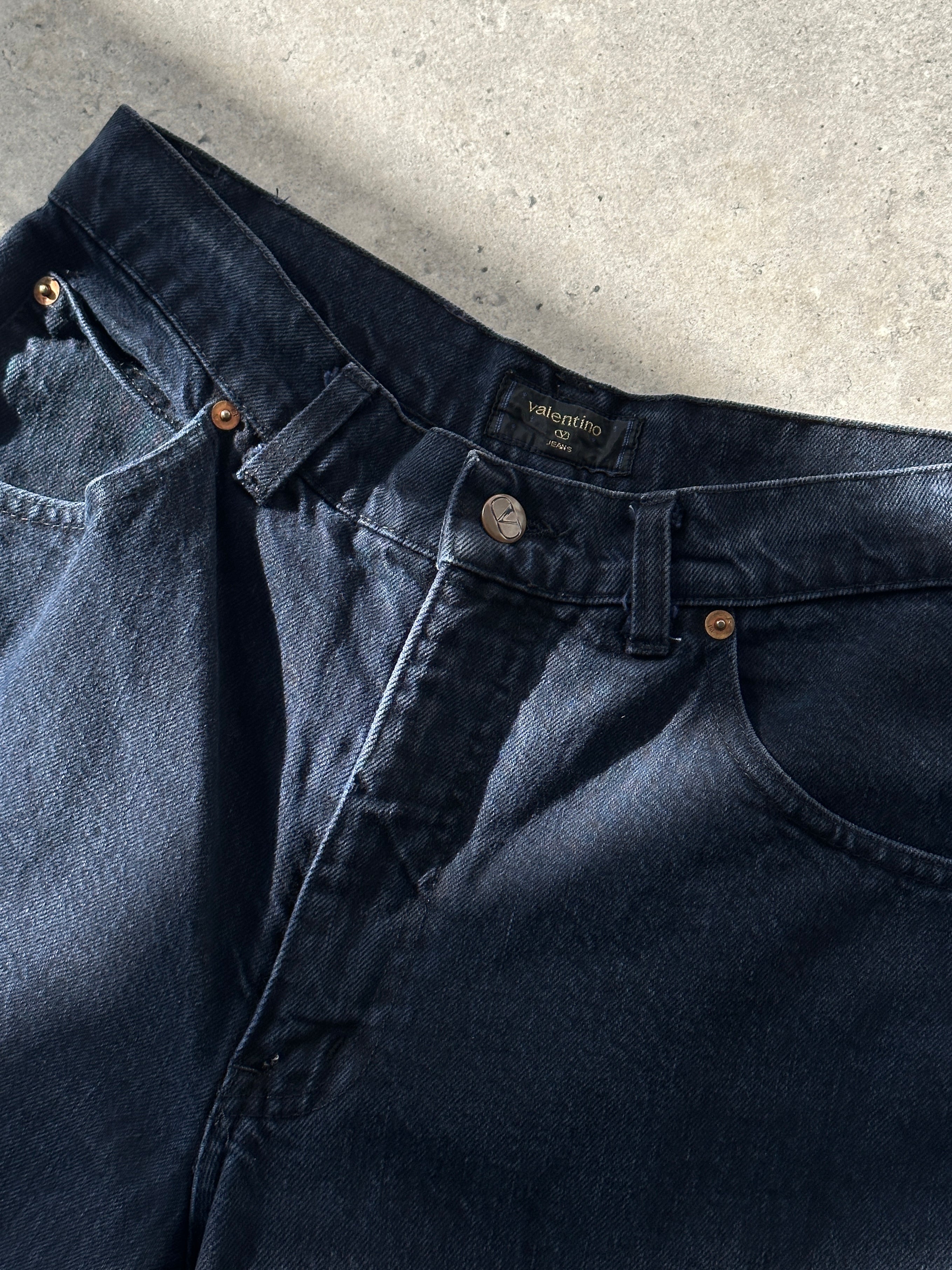 Valentino tapered high-waisted denim jeans in W28, featuring classic blue wash and slim fit style.