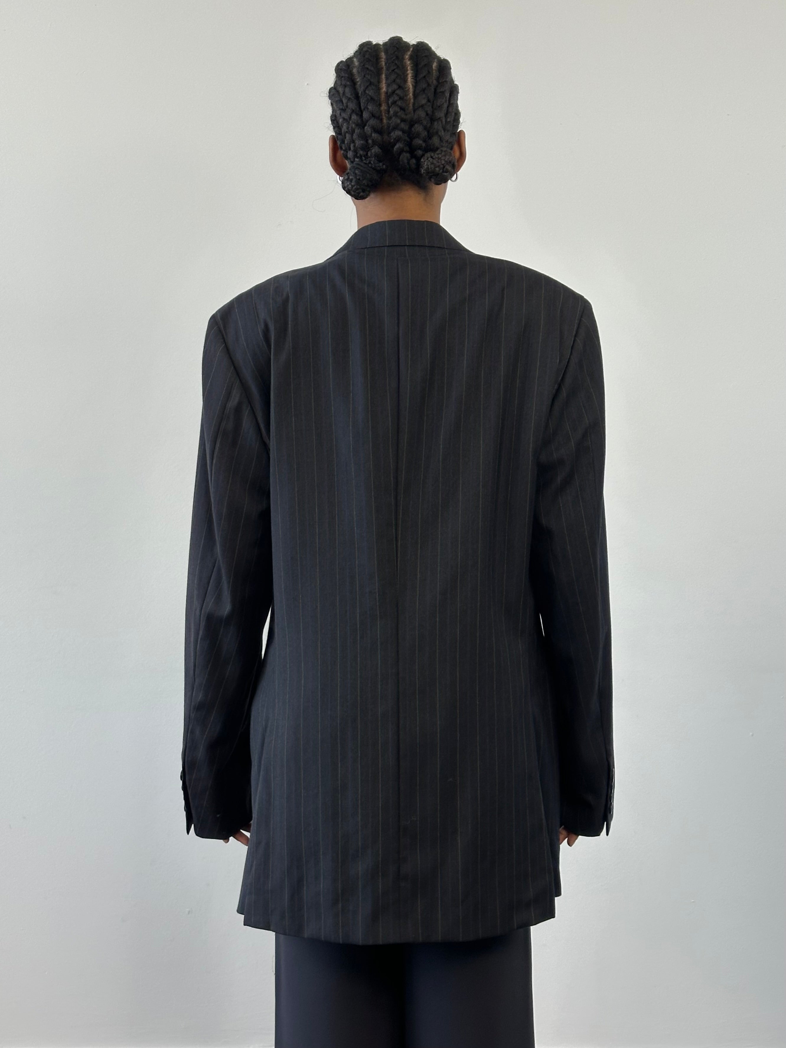 Ralph Lauren Polo 2000s pure wool stripe blazer in large/extra-large size, featuring classic tailored fit and multicolored striped pattern.