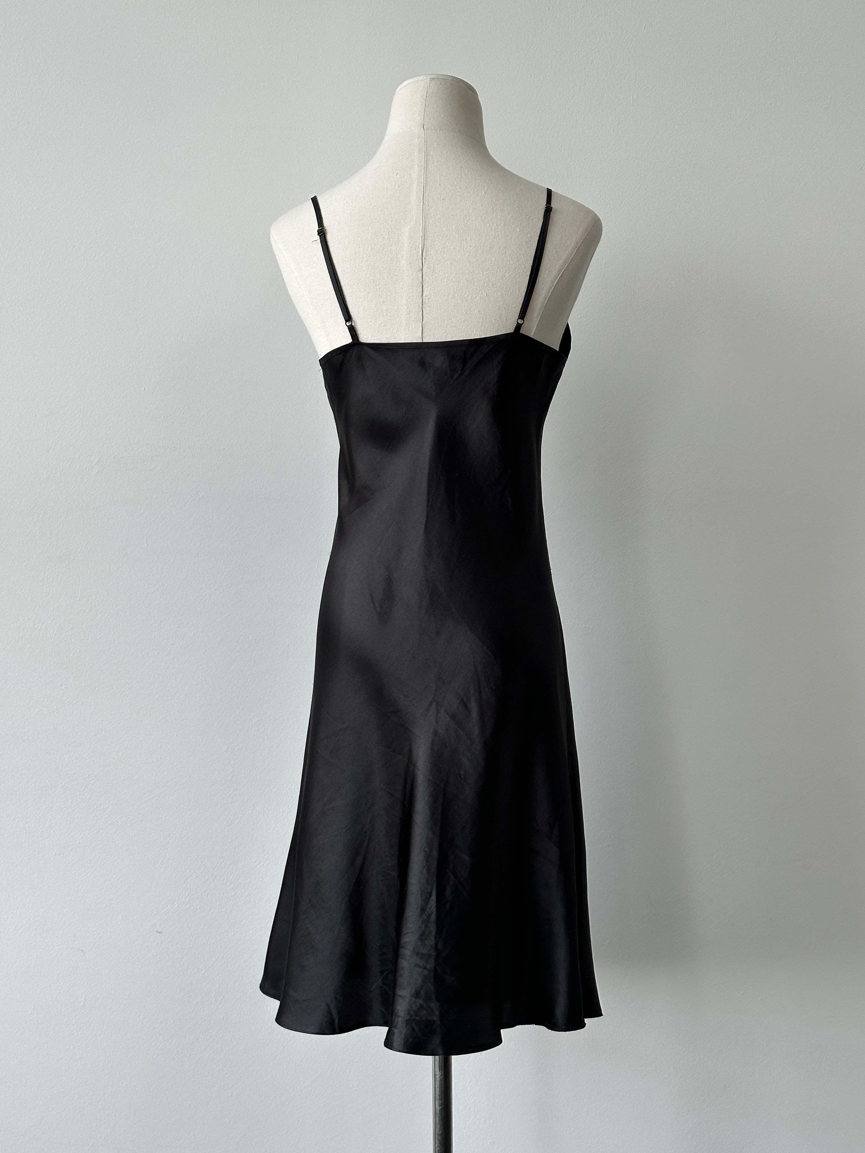 Vintage 1990s satin lace midi slip dress in size M, featuring delicate lace details and a sleek, vintage-inspired silhouette.
