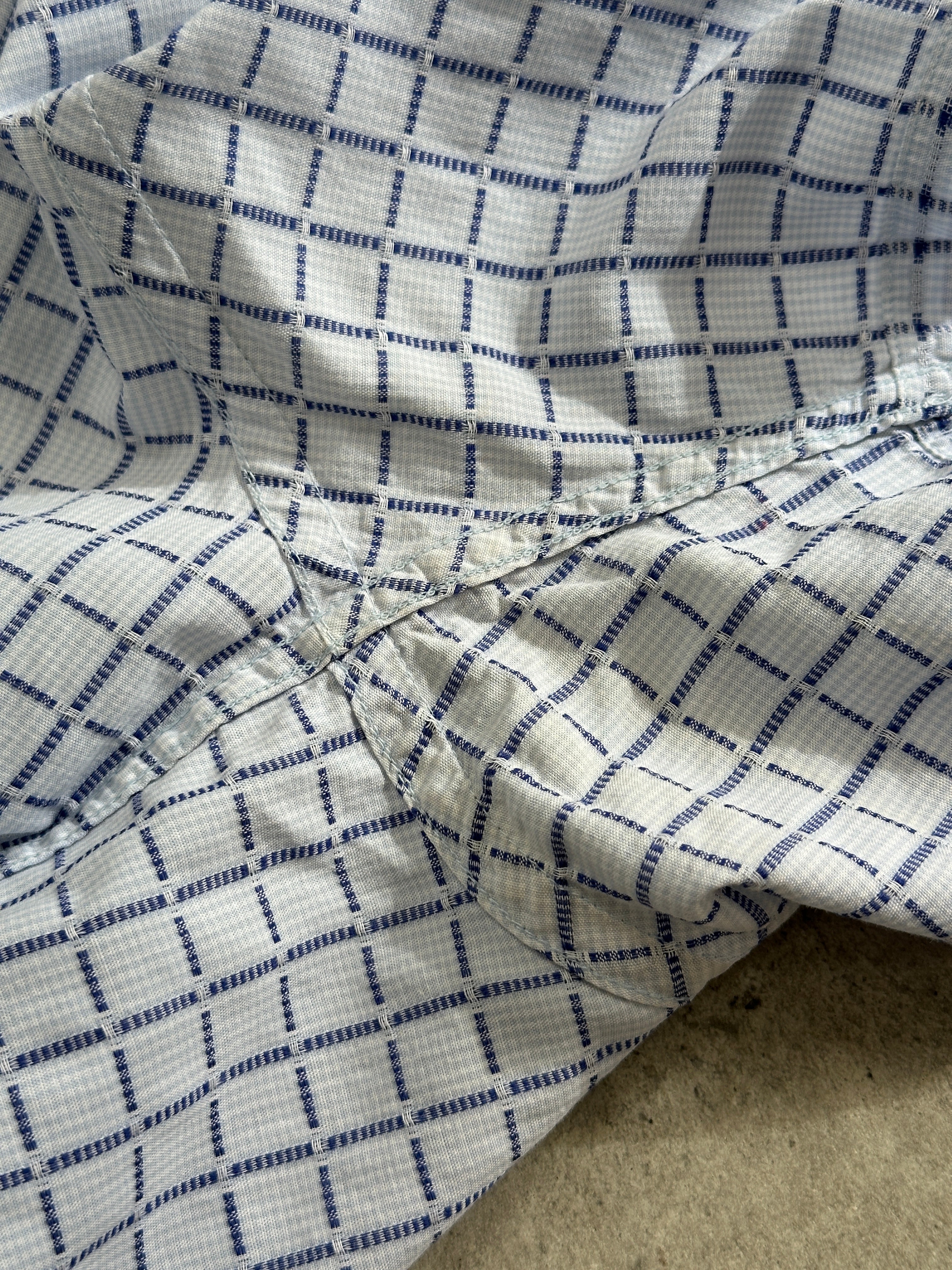 Yves Saint Laurent men's check short sleeve cotton shirt in size L with logo details, 2000s style, casual and stylish.