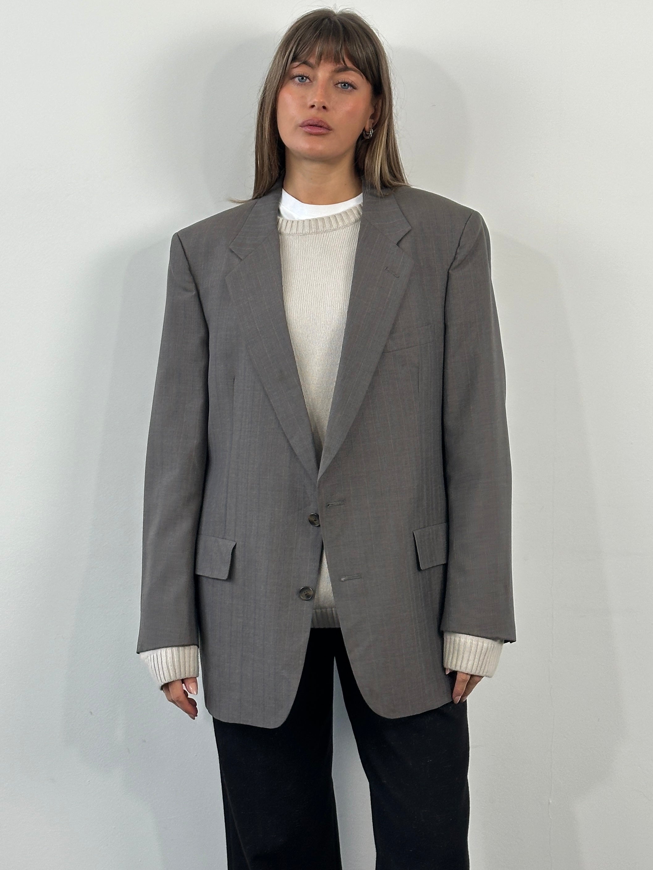 Christian Dior Monsieur 1990s striped single-breasted blazer in size 44R/XL, tailored fit with classic lapel and button closure.