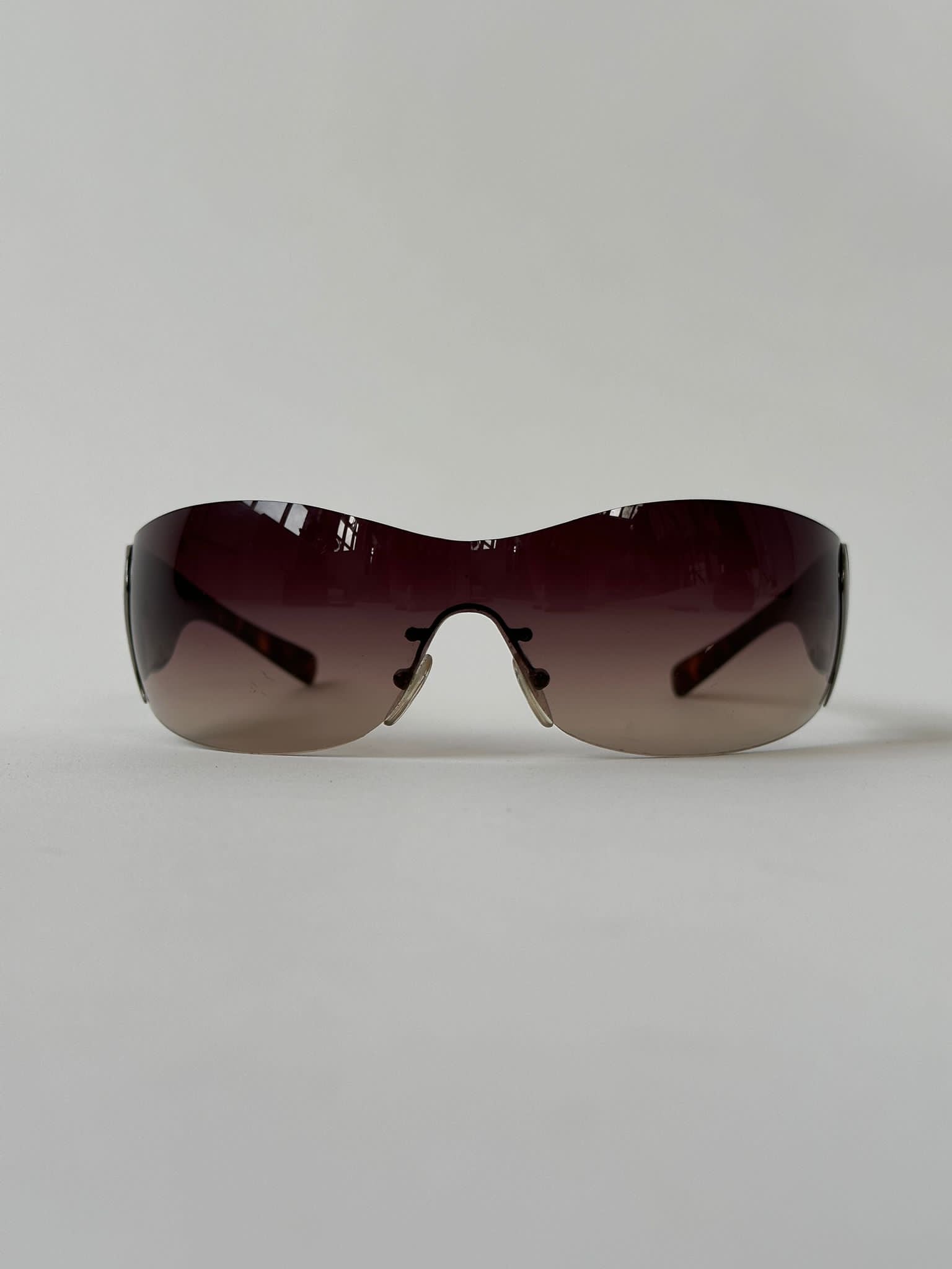 Prada shield sunglasses hot sale