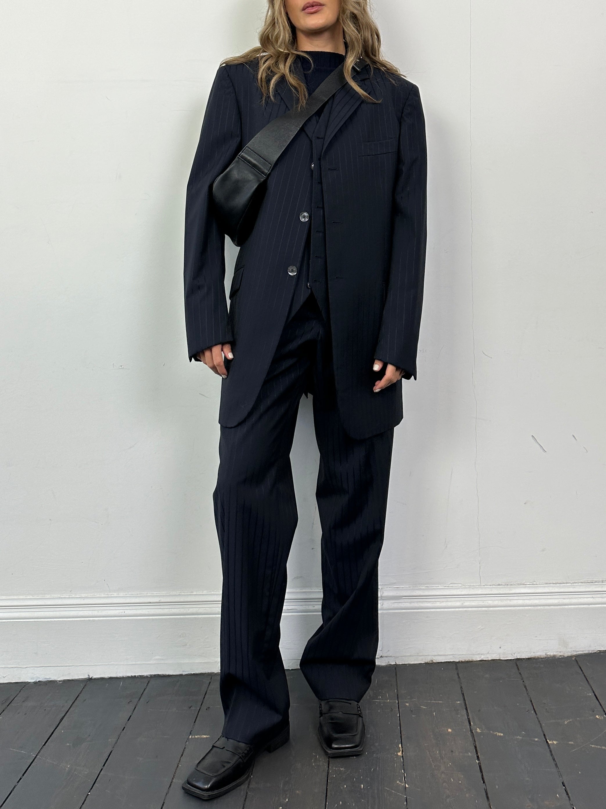 Pal Zileri pinstripe virgin wool three-piece suit, 44R/W34, displayed on a mannequin, featuring tailored jacket, waistcoat, and trousers.