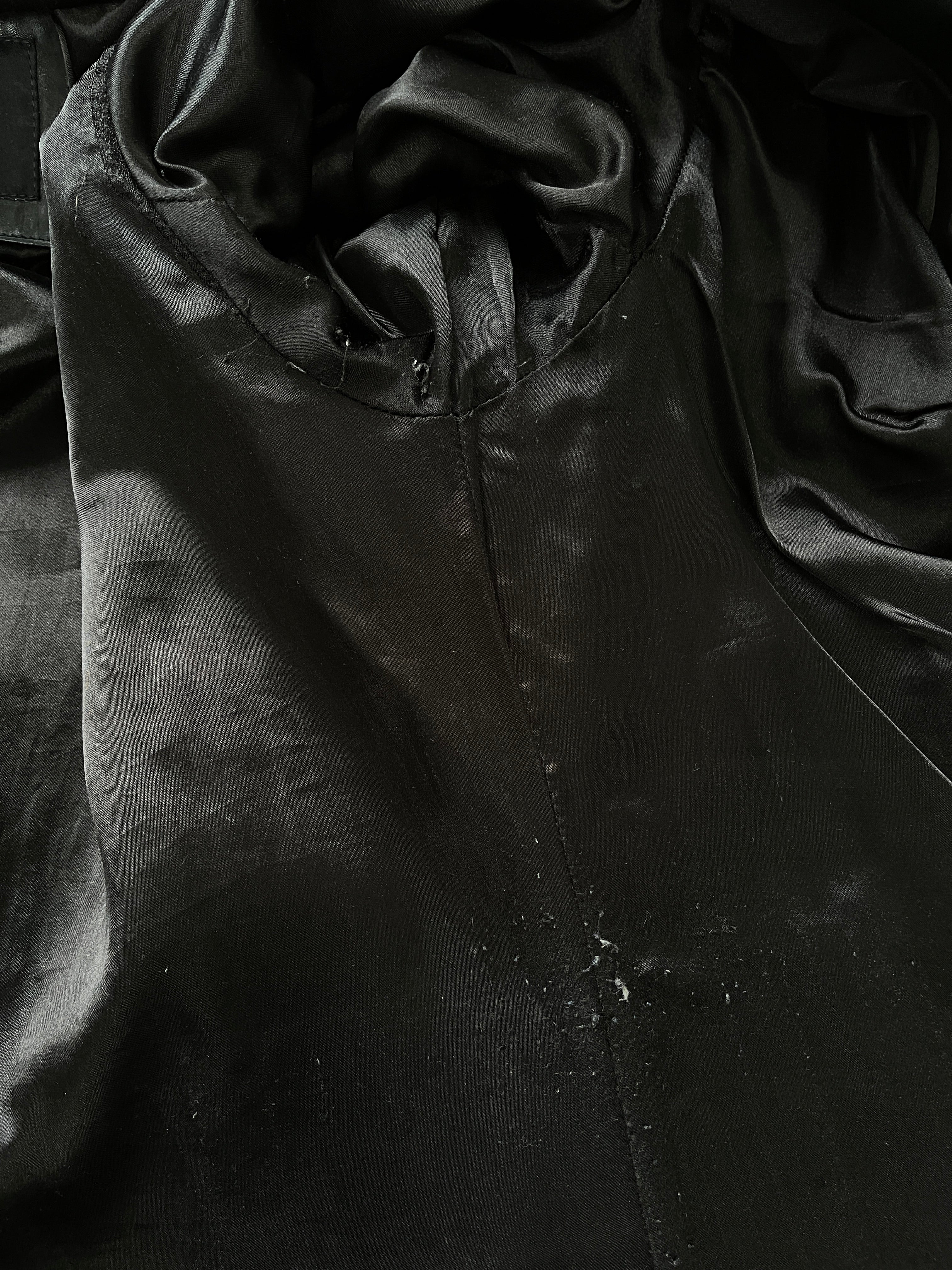 Vintage 1990s floor-length leather trench coat in black, with classic design and belt, from the Vintage brand.