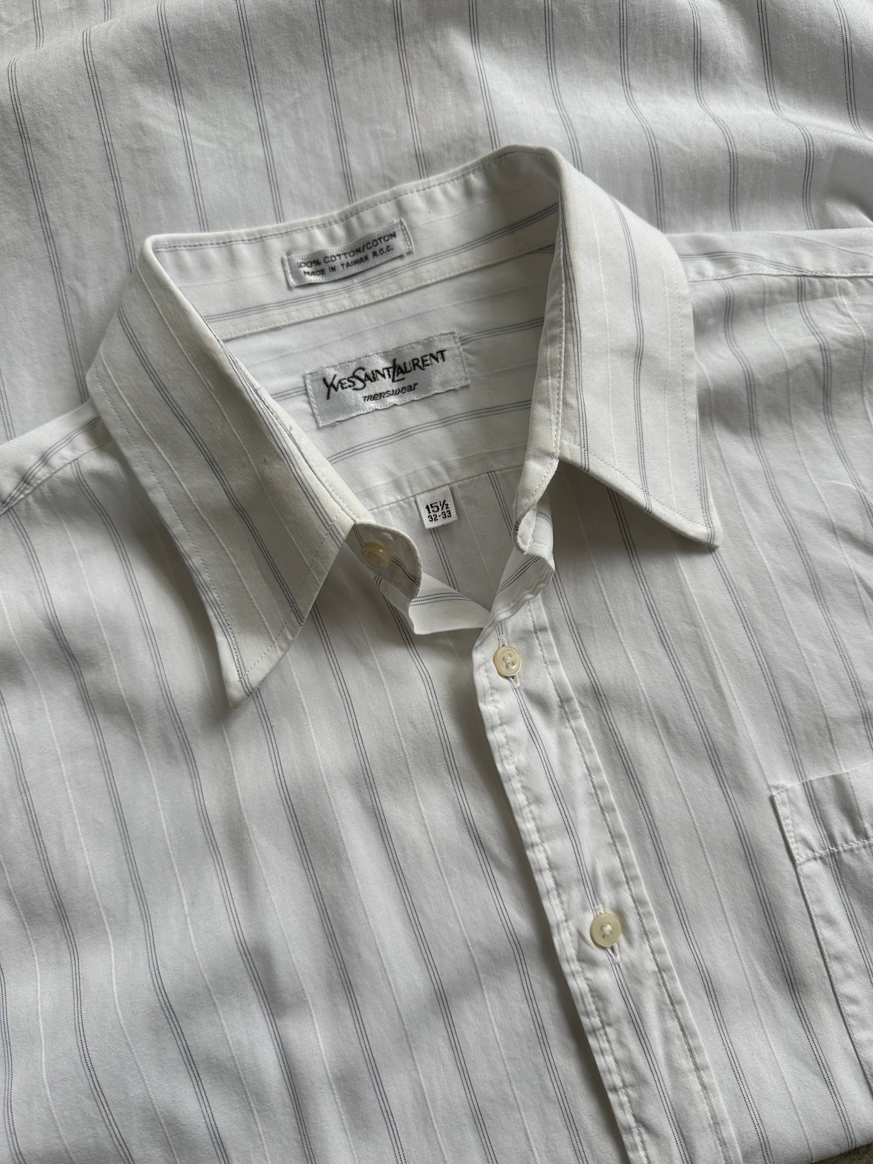 Yves Saint Laurent pinstripe pure cotton shirt in size M, featuring a classic button-up design with a collar and long sleeves.
