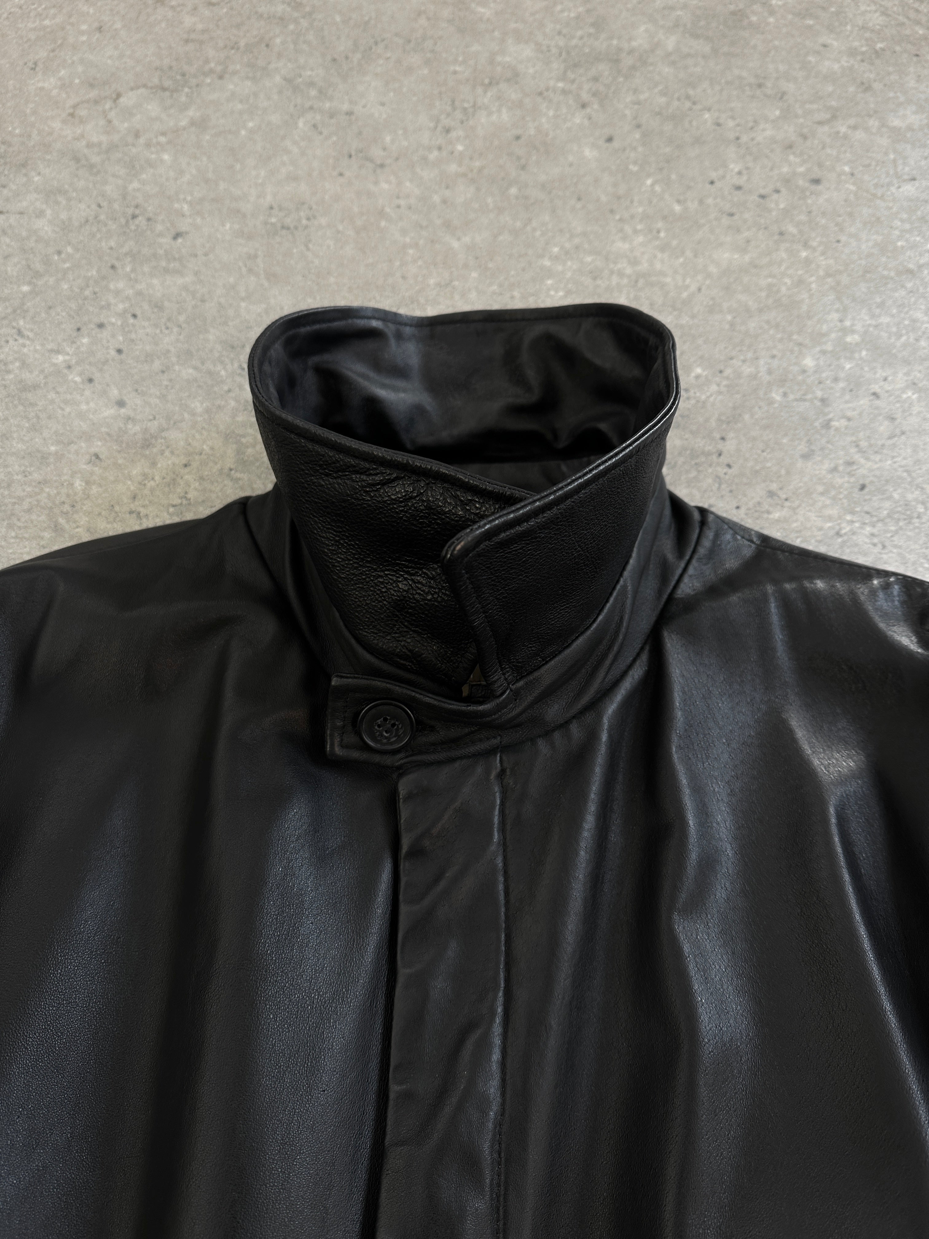 Conbipel 1990s leather belted trench coat in XL, featuring classic design with a leather jacket style and button details.