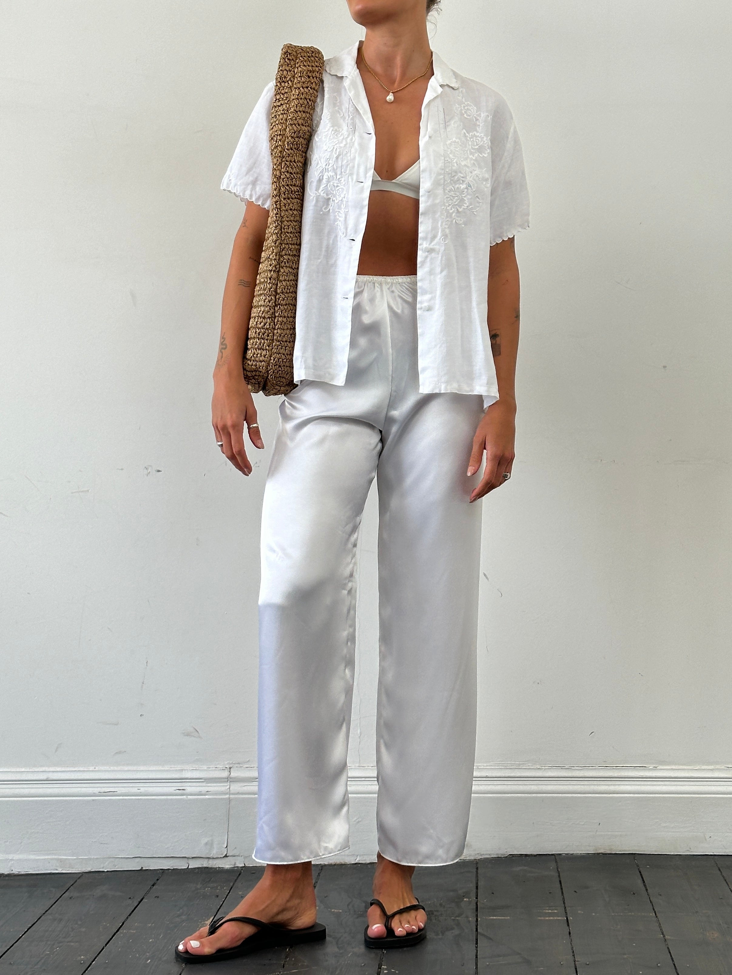 Vintage satin elasticated straight leg trousers in W25-28, featuring a sleek, shiny fabric and relaxed fit with comfortable waist.