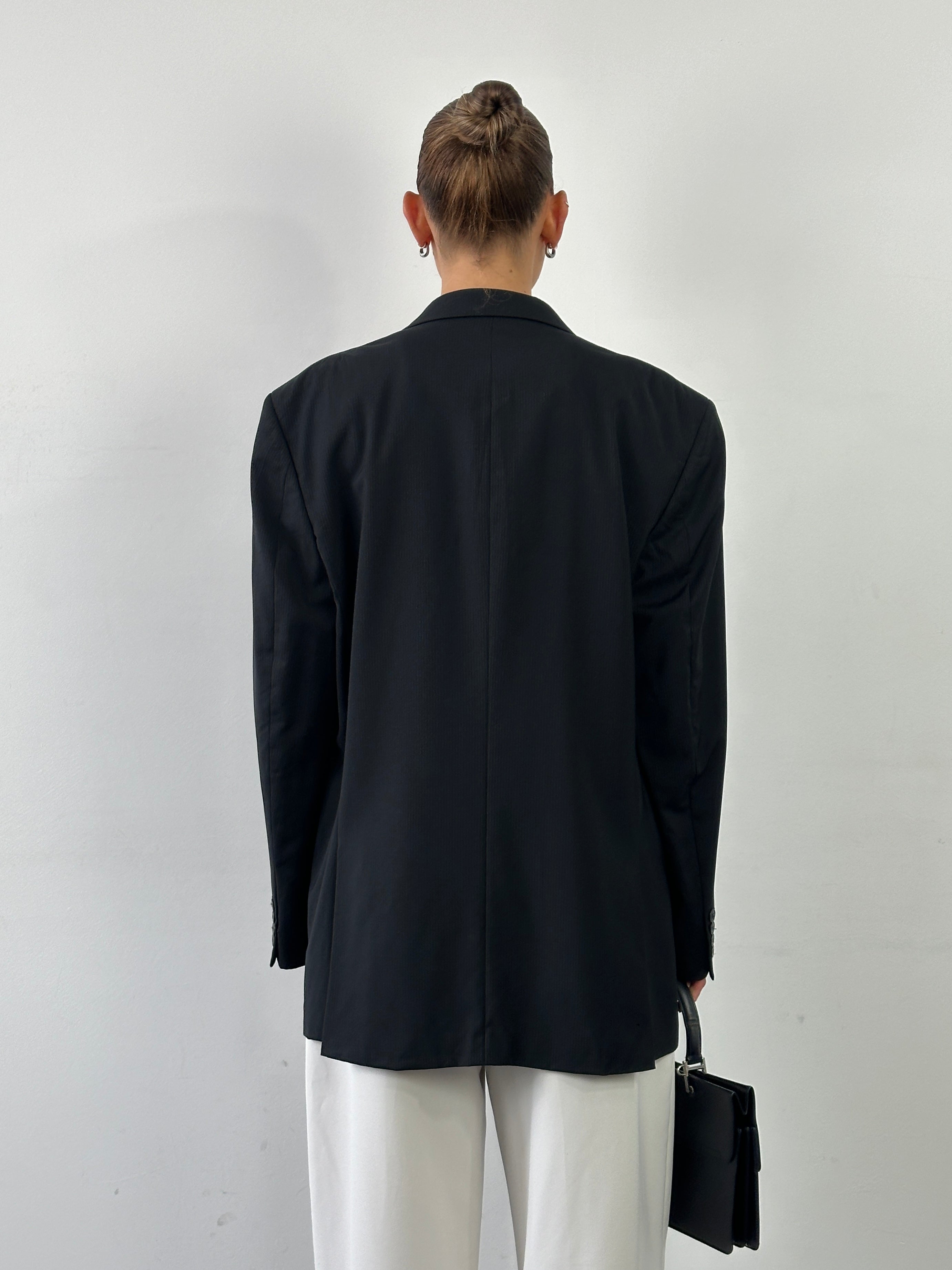 Yves Saint Laurent Pour Homme 1990s pure wool pinstripe blazer in size 42R/XL, tailored fit with classic lapels and button closure.