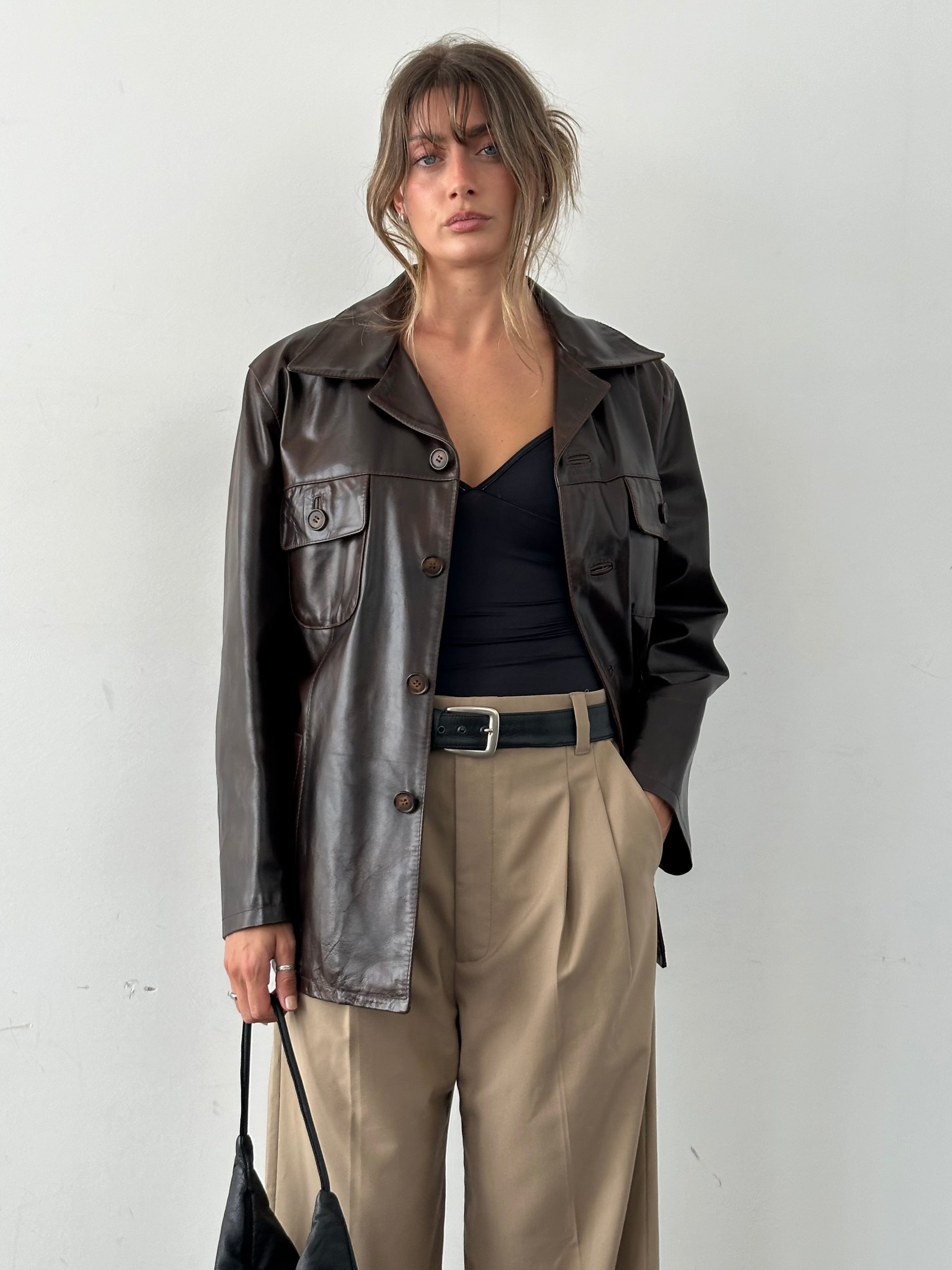 Conbipel boxy leather jacket in size L, featuring a stylish design with a smooth leather finish and classic collar.