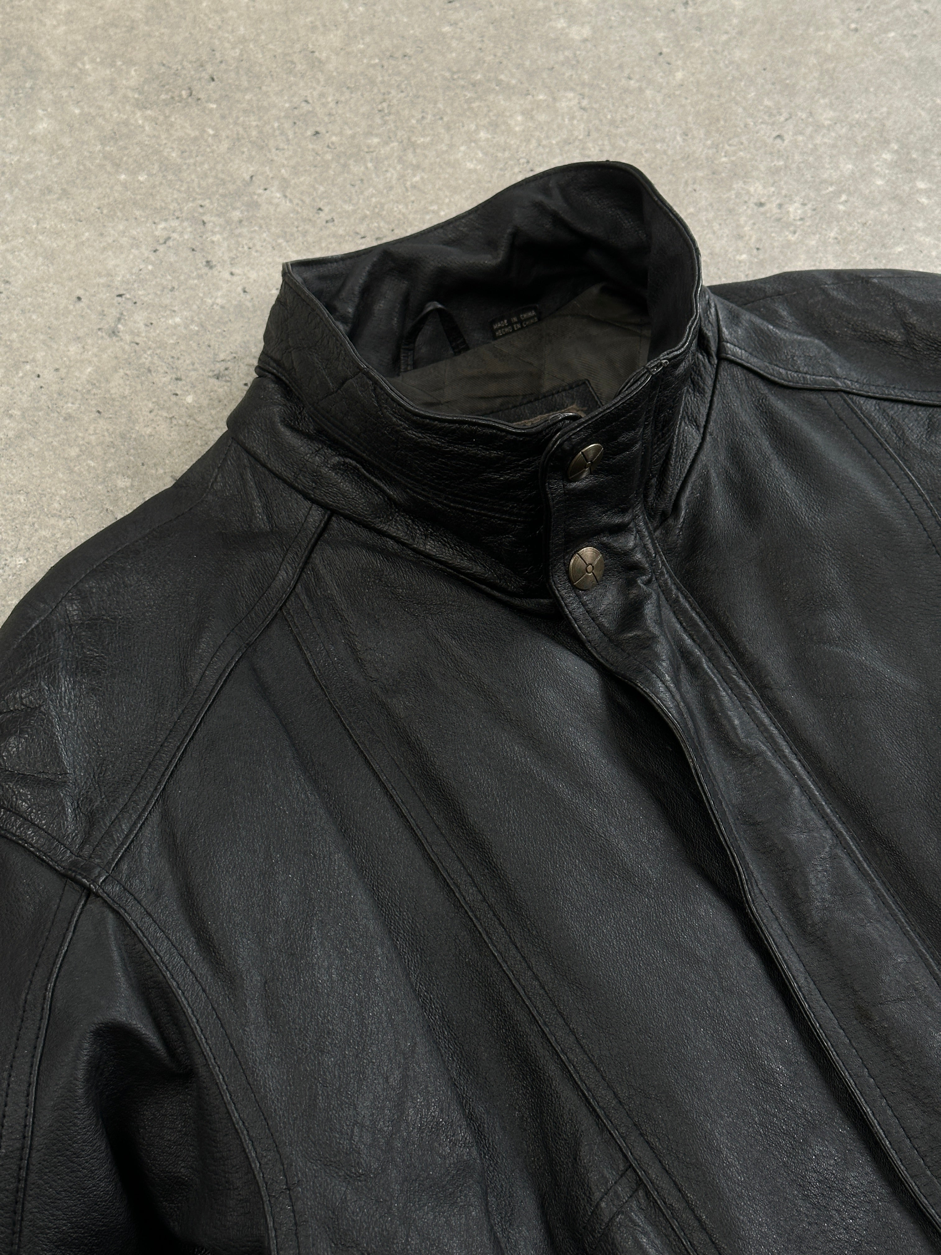 Vintage high neck leather bomber jacket in XL, featuring a classic design with a smooth leather finish and zip closure.