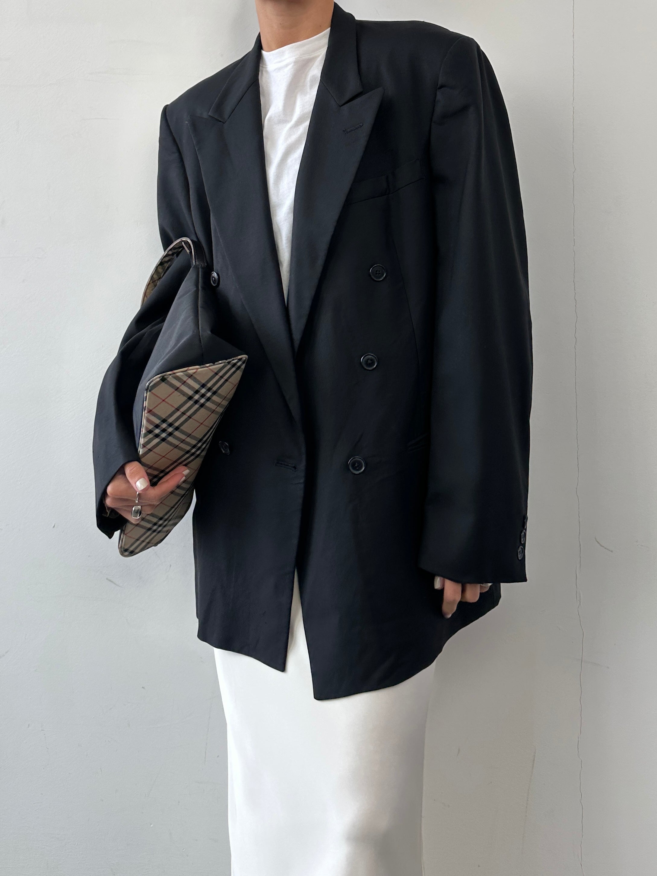 Christian Dior pure wool double-breasted blazer in size L/XL, tailored fit with classic lapels and button details.