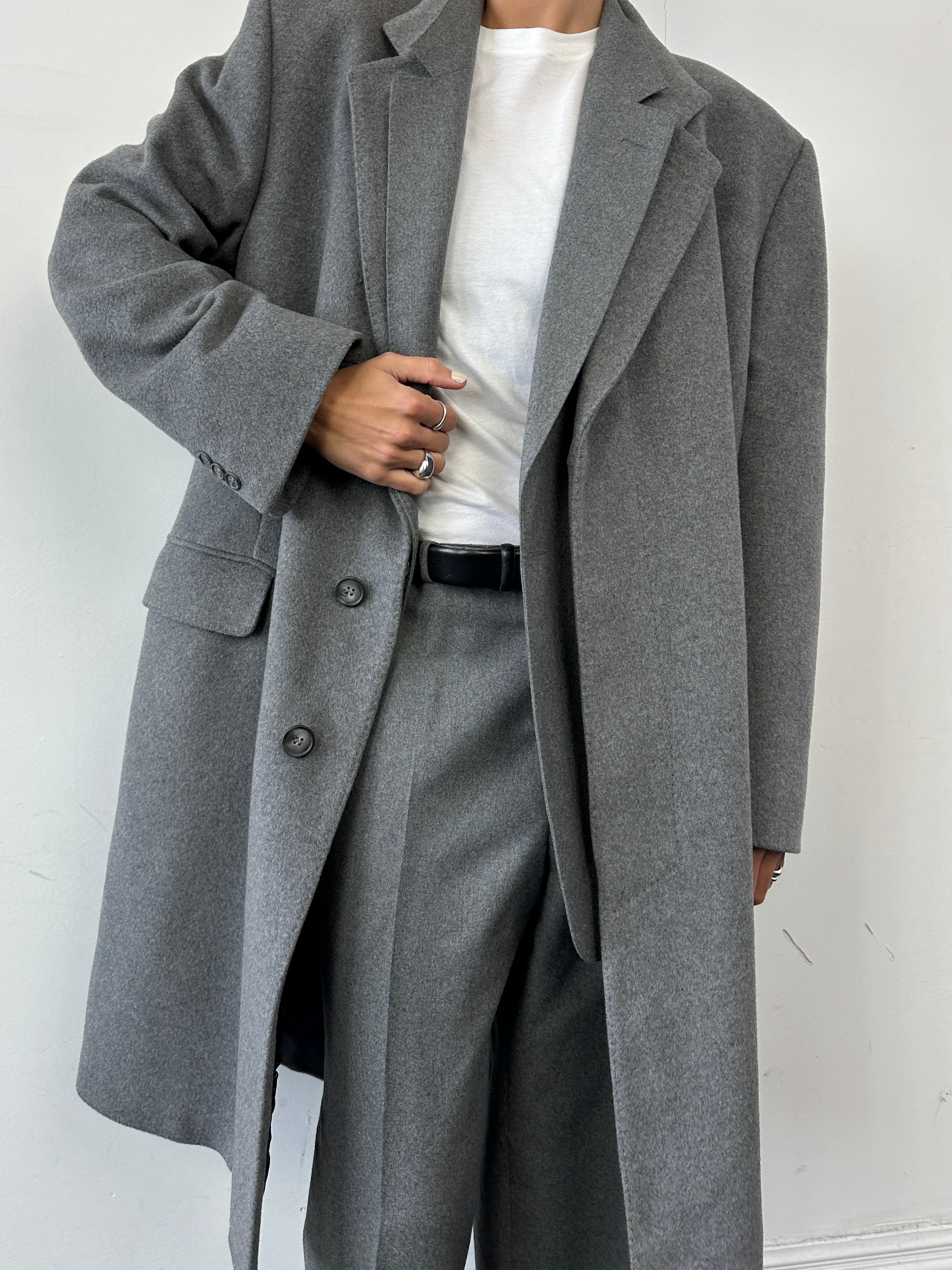 Christian Dior wool single-breasted suit jumpsuit in size 44R/W32, tailored fit, with lapel collar and sleek design.