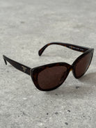 Prada Tortoise Shell Round Logo Sunglasses - SYLK