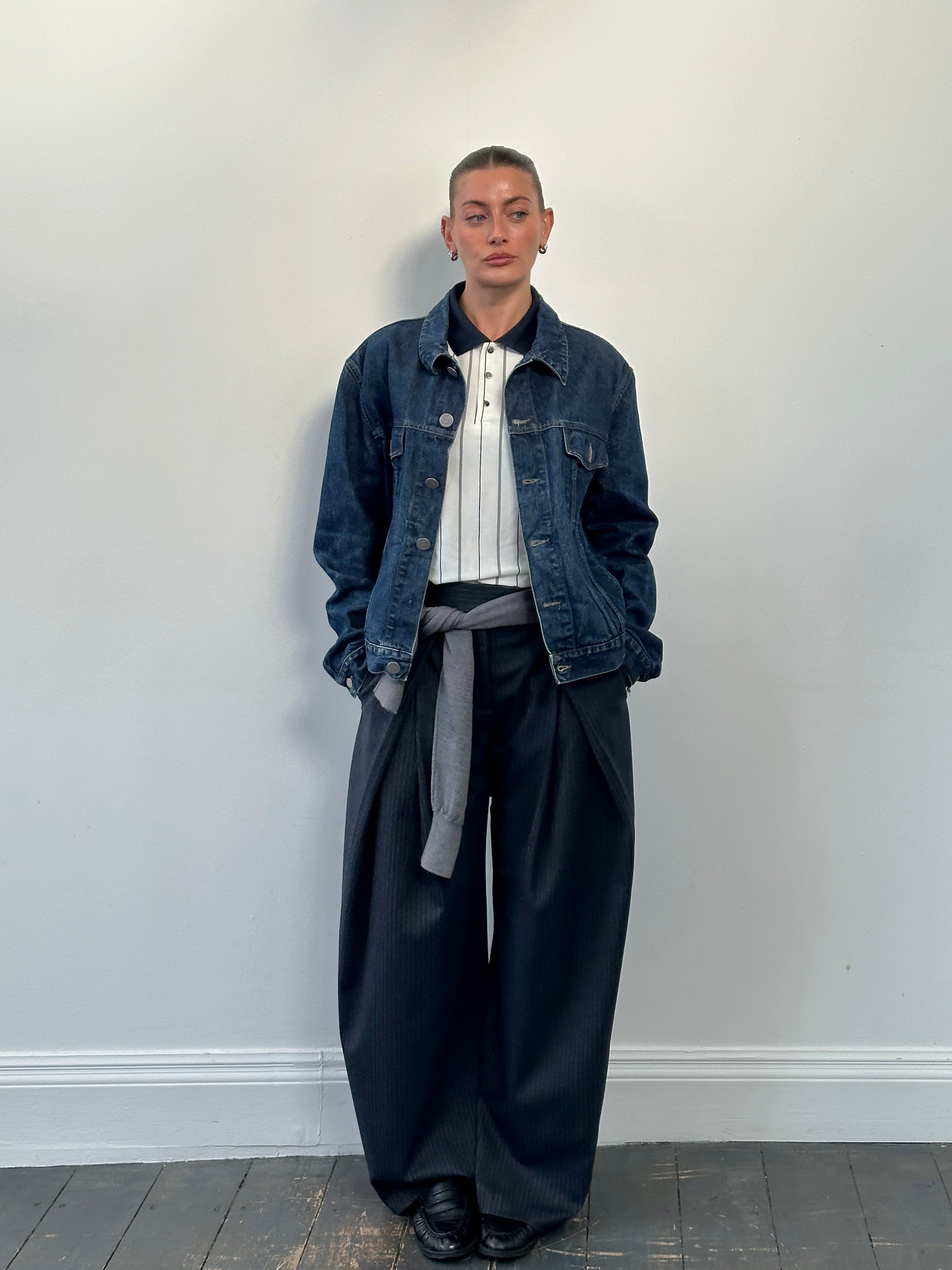 Armani Jeans 1900s mid wash denim jacket in size L, featuring classic styling and visible stitching details.