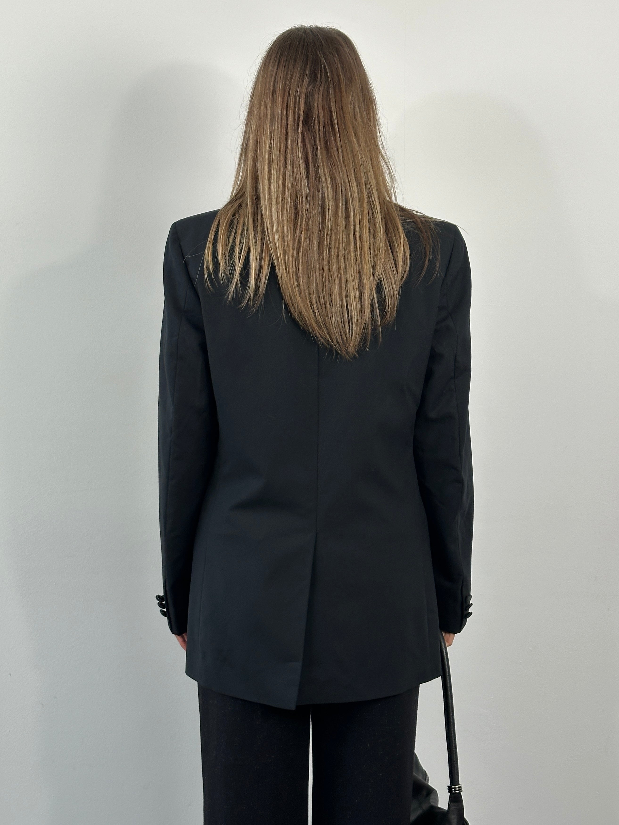 Yves Saint Laurent 1990s pure wool tuxedo blazer in black, size 38R/M, tailored fit with satin lapels and classic design.