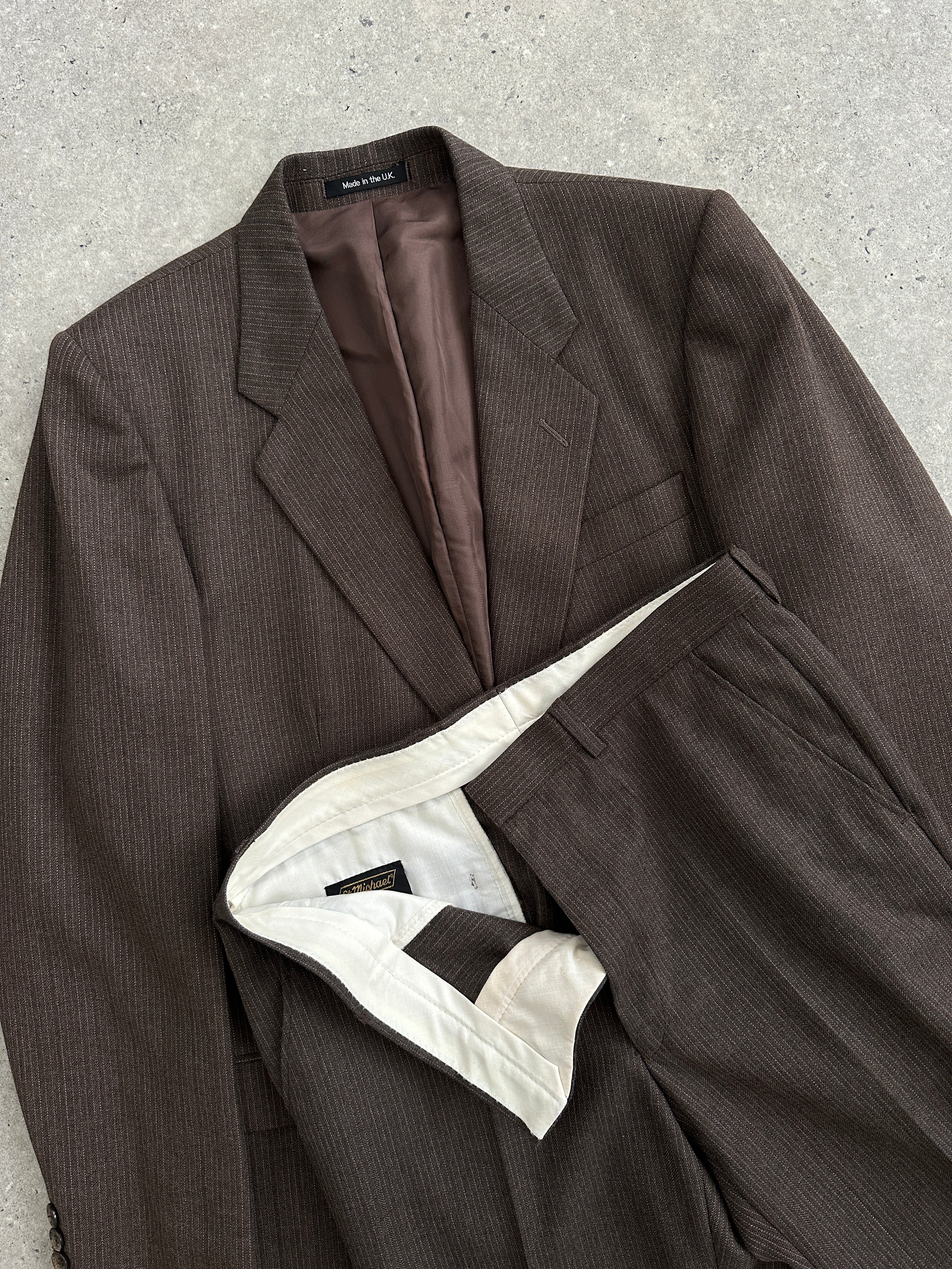 St Michael pinstripe worsted wool jumpsuit, single-breasted, size 38R/W30, tailored fit with classic pinstripe pattern.