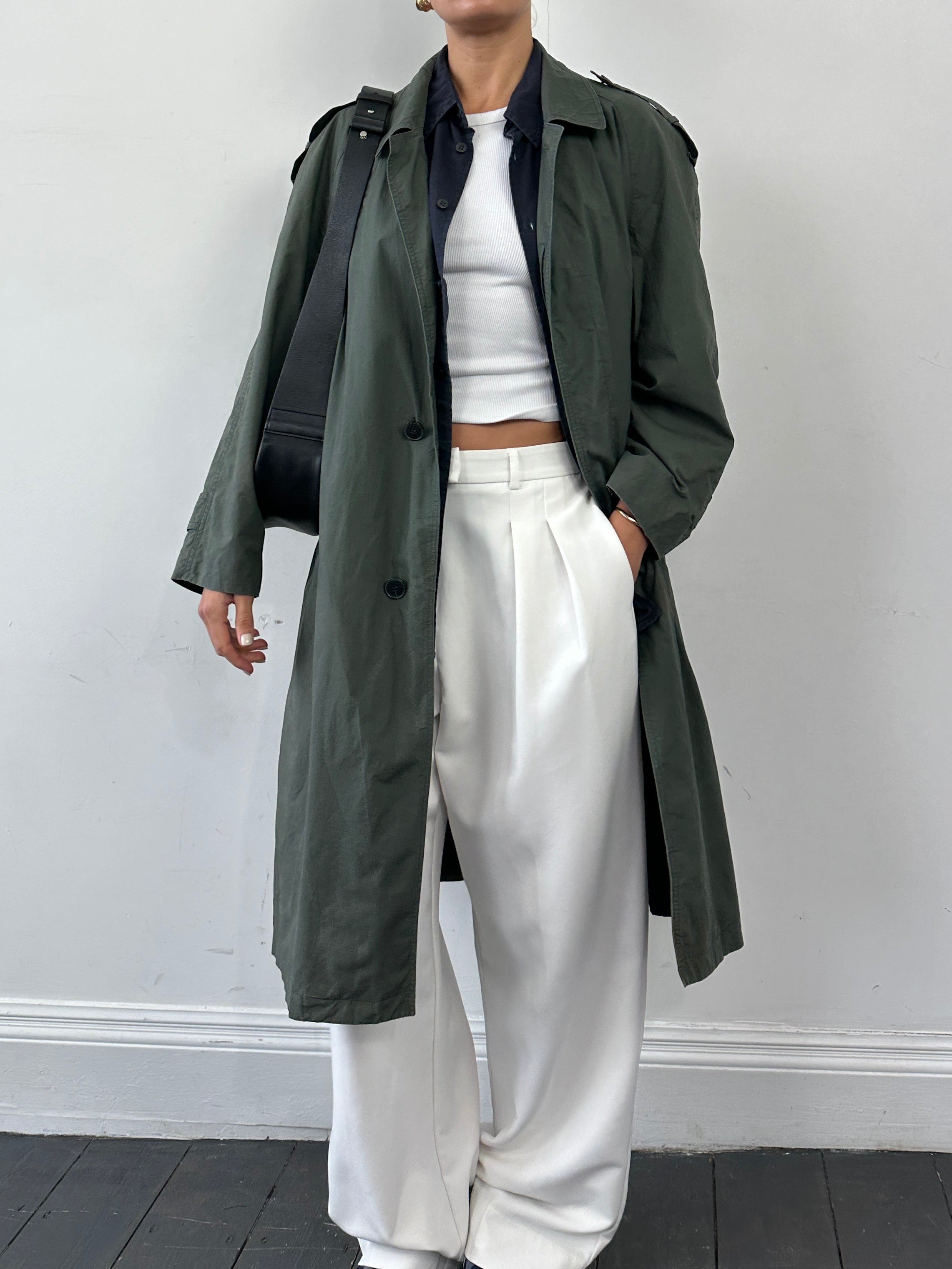 Yves Saint Laurent Diffusion Hommes pure cotton trench coat with concealed placket in size L, shown on a hanger.