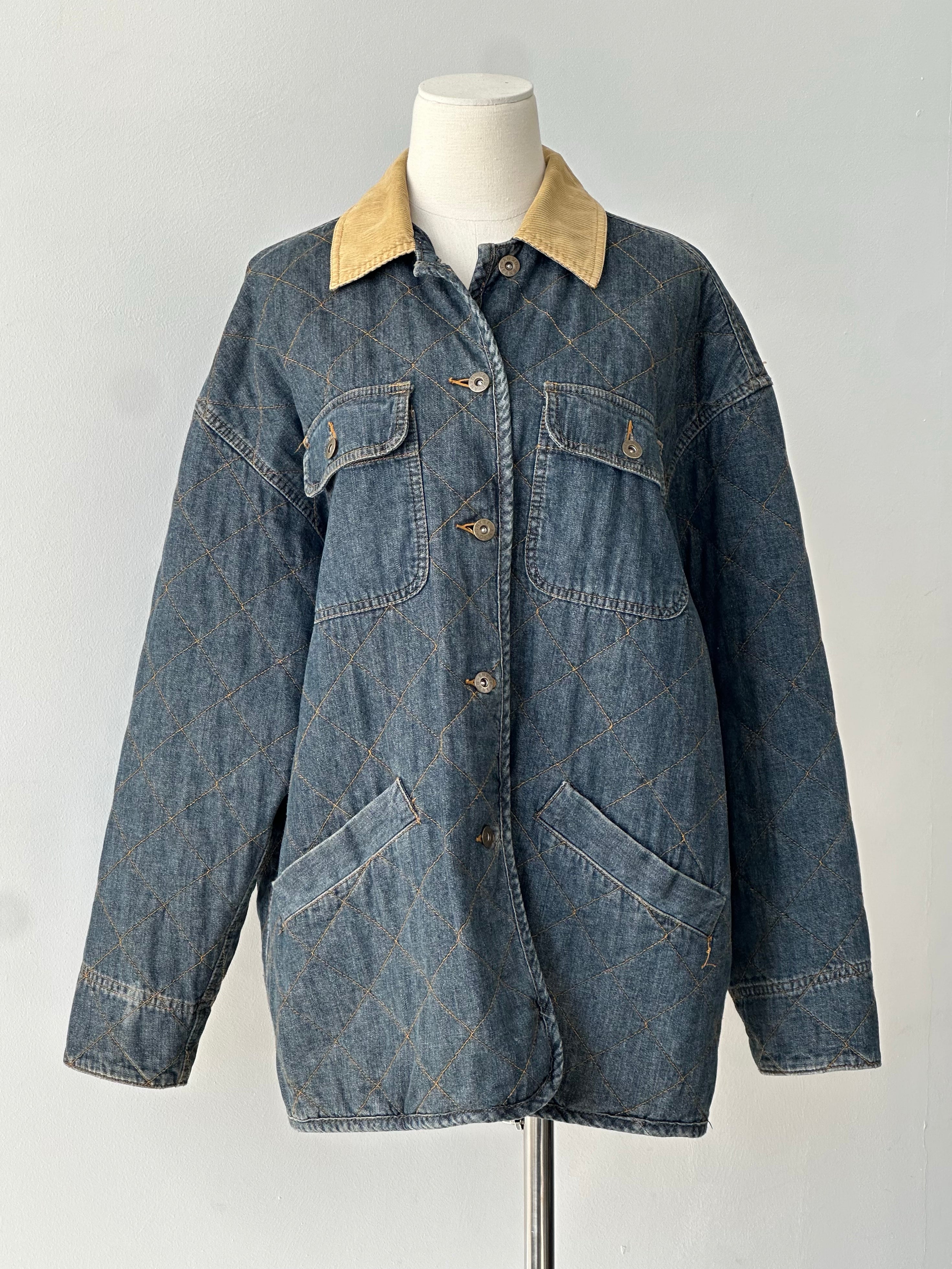 DKNY Jeans 1990s pure cotton jacket, size large, featuring classic design and lightweight fabric, displayed on a hanger.