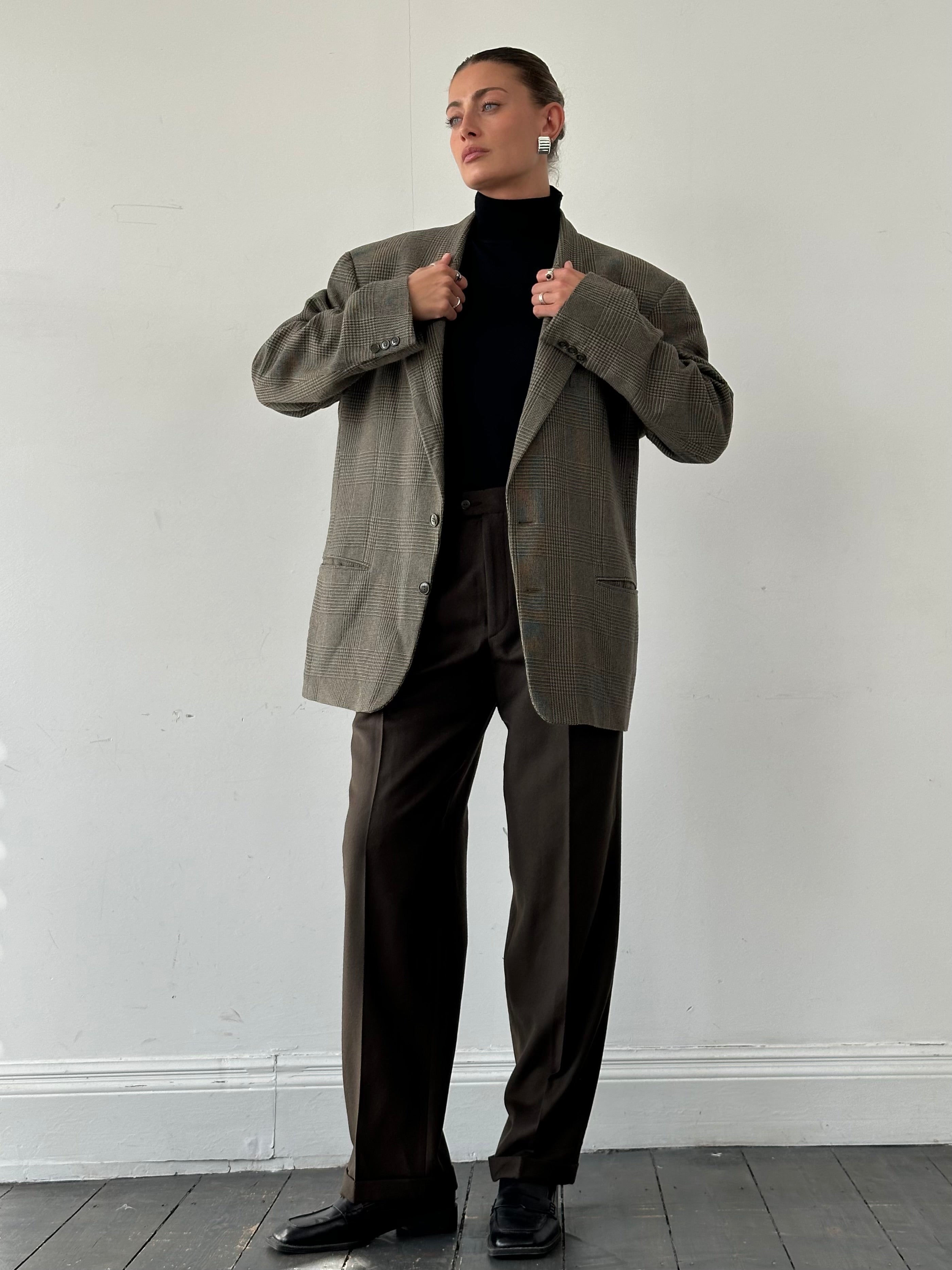 Vintage Italian brushed wool straight leg trousers in size W30, showcasing classic tailored fit and textured fabric.