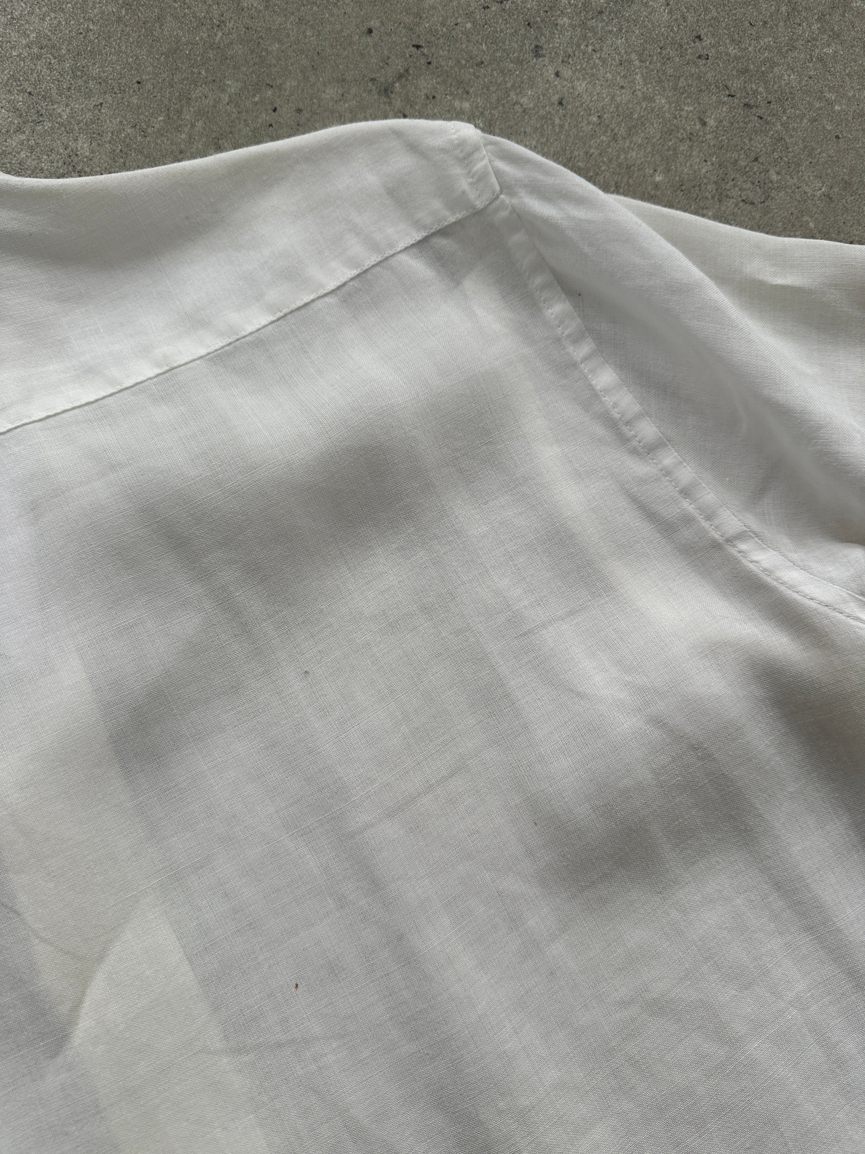 Guess Pure Linen Sheer Short Sleeve Shirt in white, lightweight and breathable with a relaxed fit, for casual or warm weather wear.