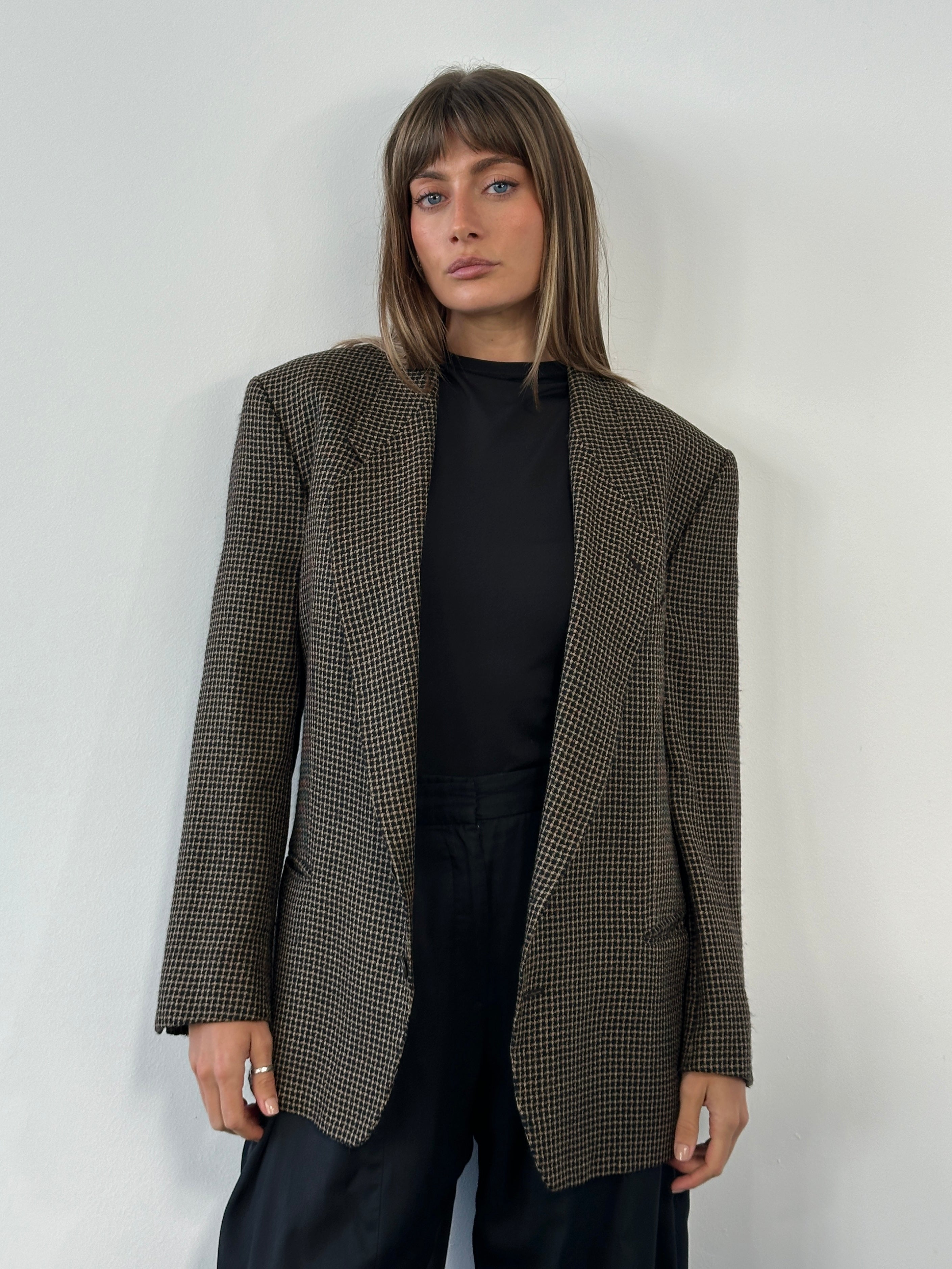 Giorgio Armani 1990s wool silk check blazer in size 42R/L, tailored fit, featuring classic check pattern and structured lapels.