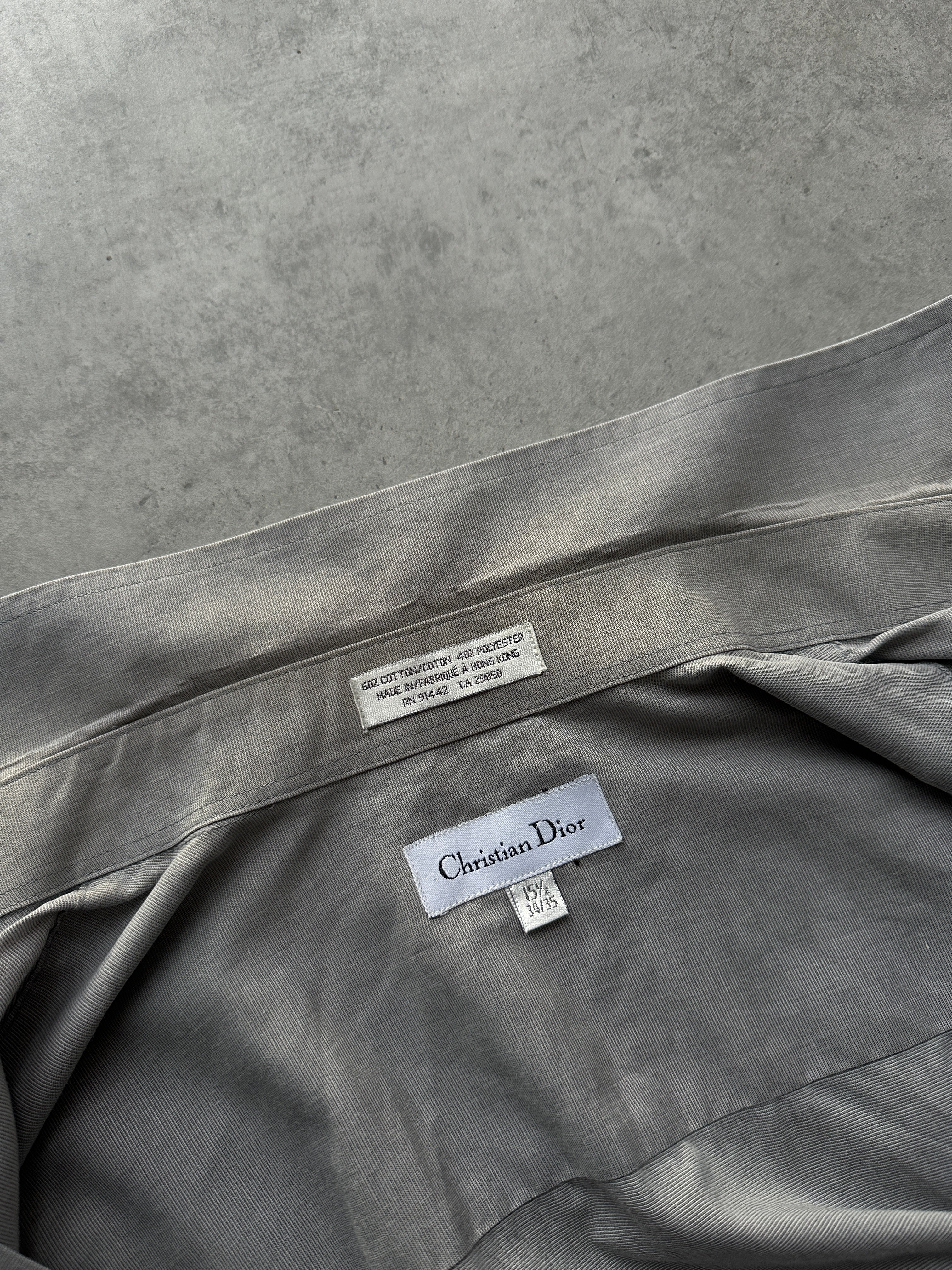Christian Dior 1980s cotton shirt in size L/XL, featuring classic design and high-quality fabric, displayed on a hanger.