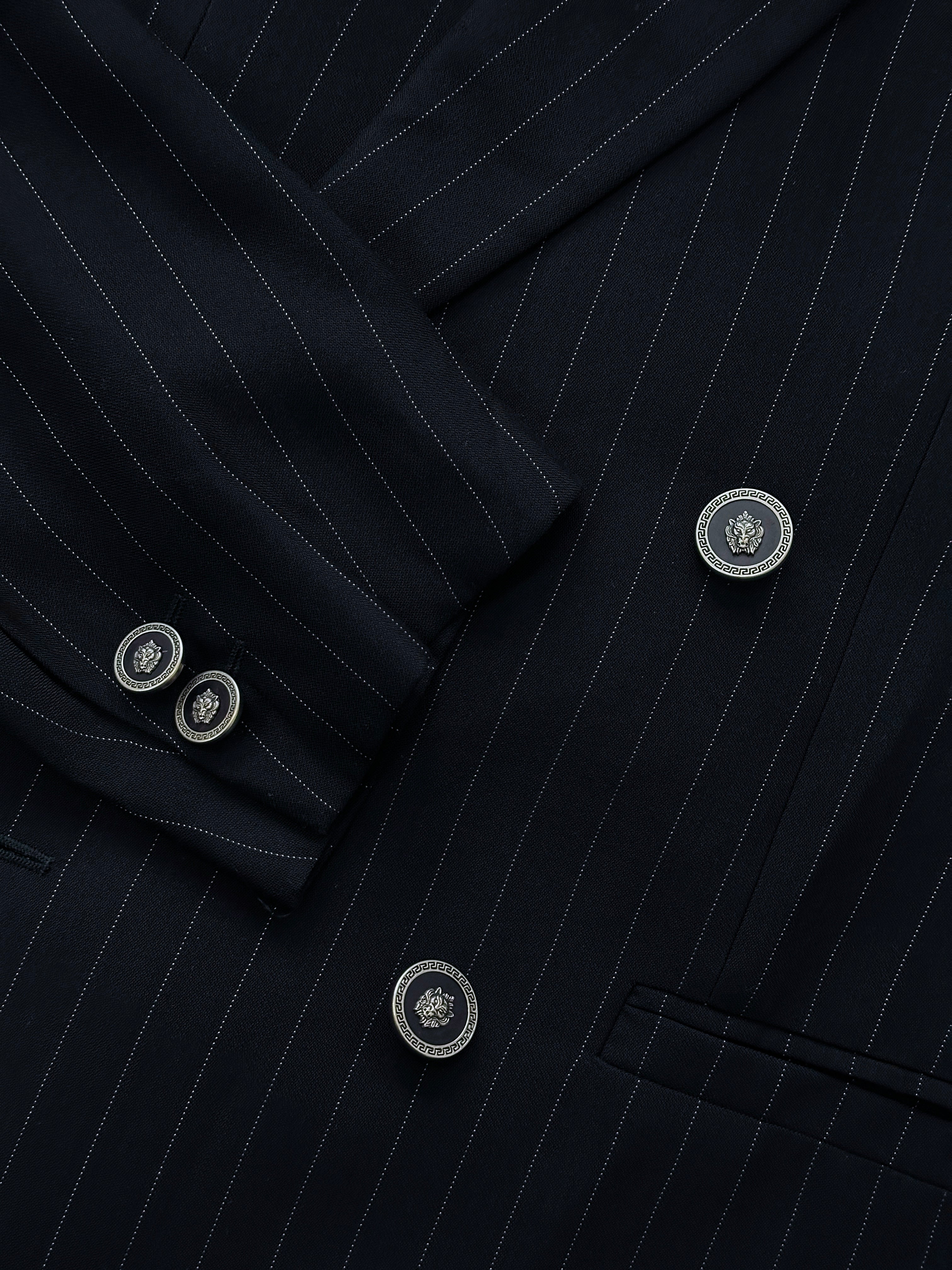 Gianni Versace Versus 1990s pinstripe bespoke double-breasted suit, size 44L/W34, featuring classic tailored design and sharp lapels.