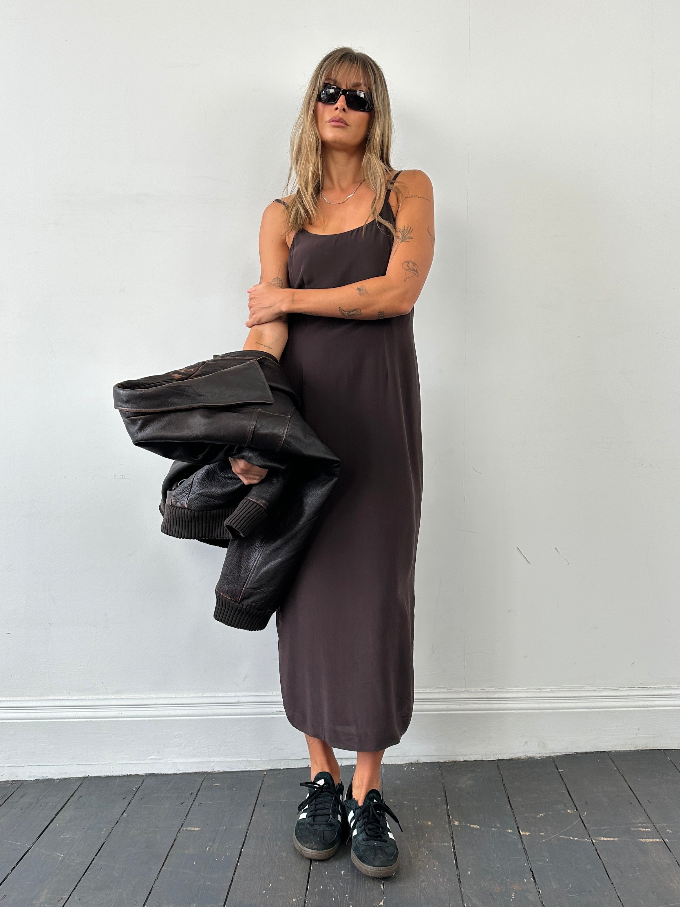 Laura Ashley pure silk floor-length slip dress in size M, elegant and smooth fabric, shown on a hanger.