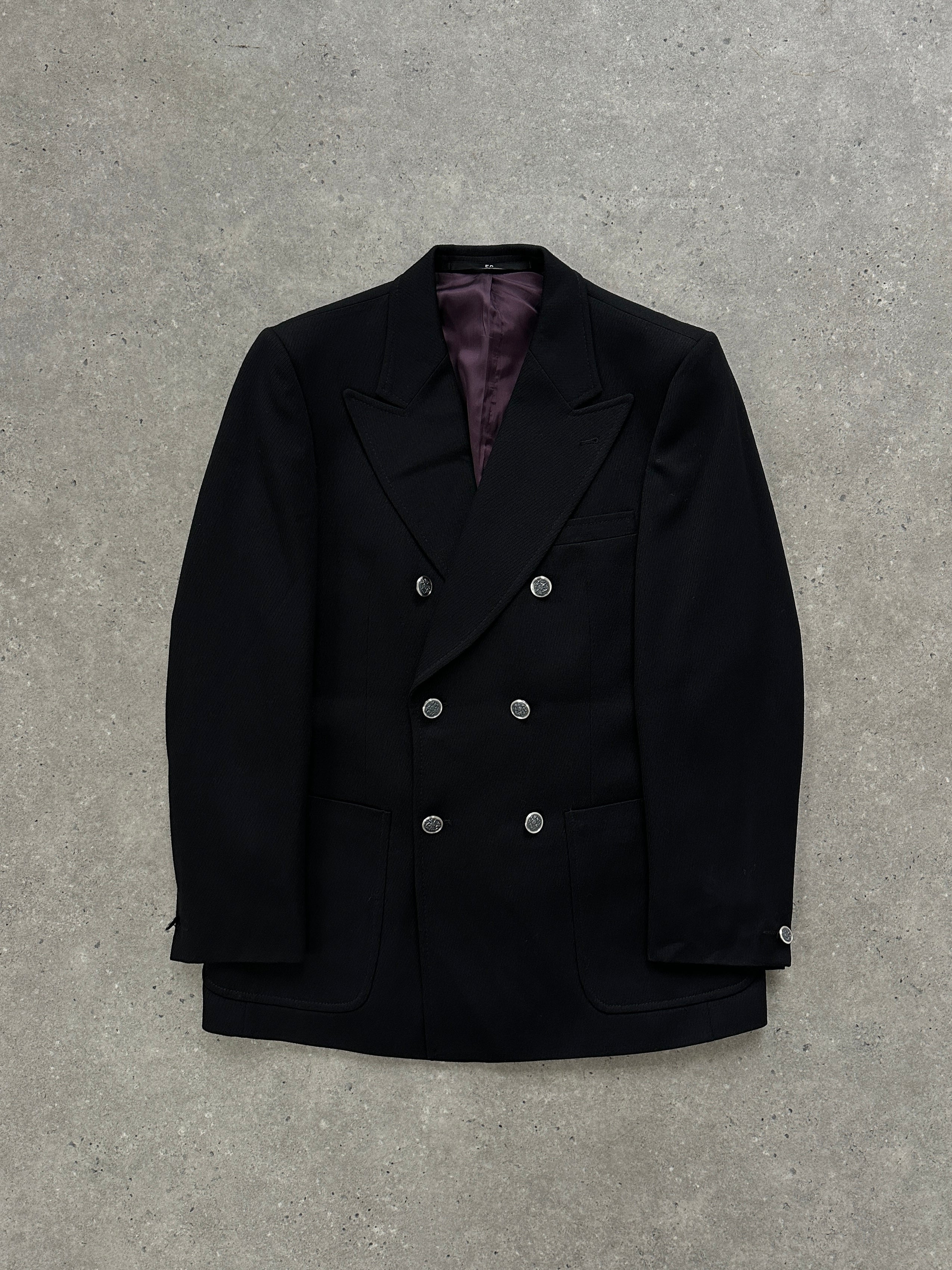 Vintage wool double-breasted blazer in size L, tailored fit with classic lapels and textured fabric, perfect for a sophisticated look.