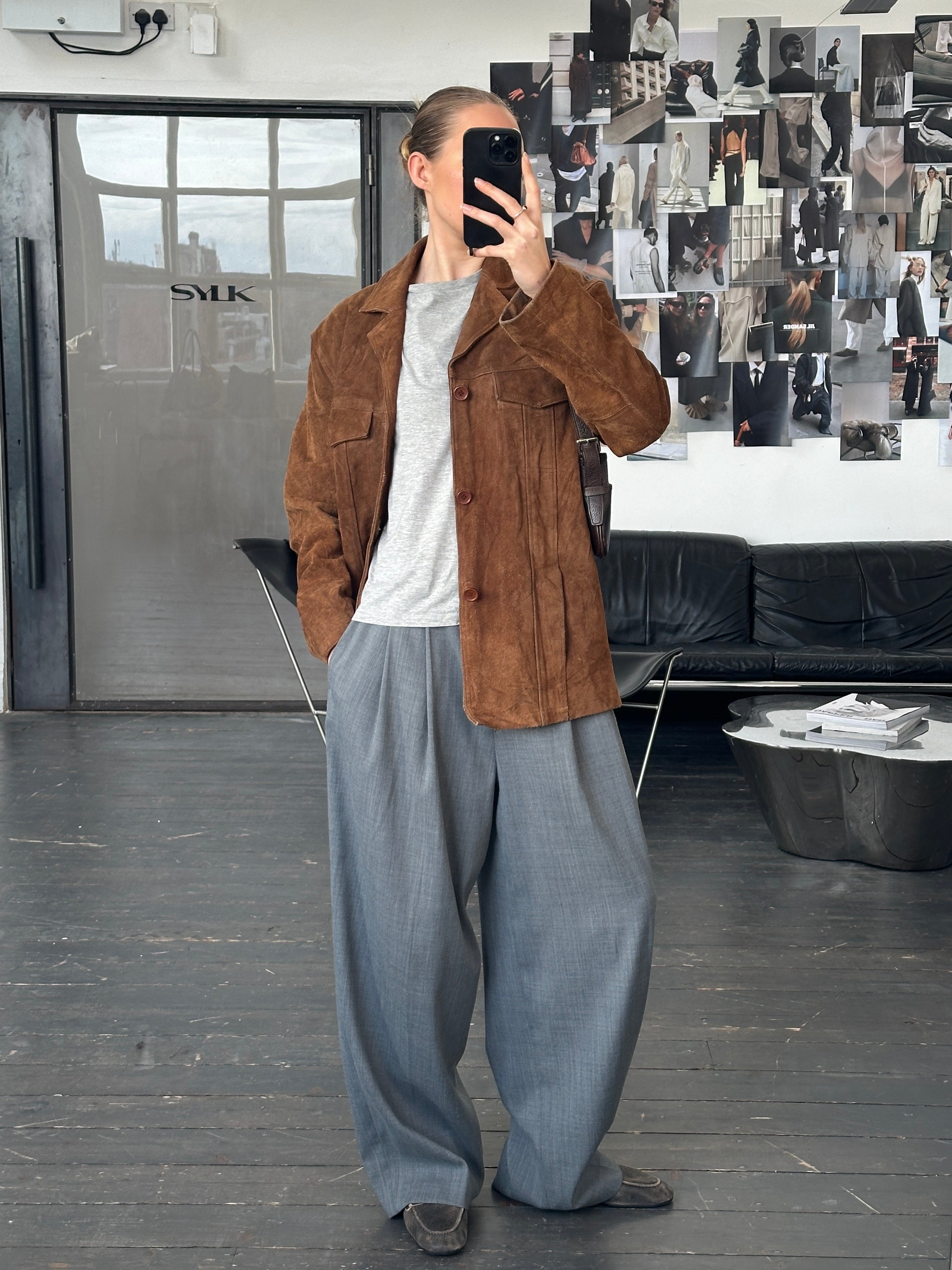 Vintage 1990s suede leather jacket in size large, featuring classic design and soft brown material, vintage style and craftsmanship.