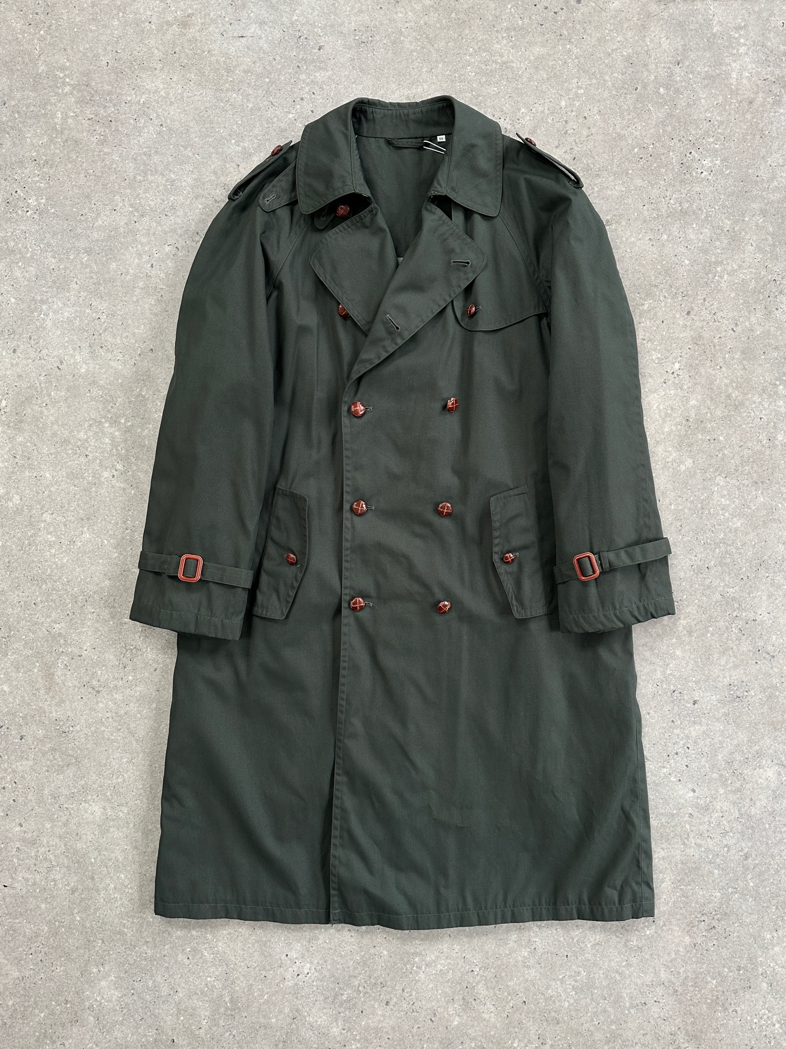 Vintage double-breasted trench coat in XL/XXL size, classic style with belt and shoulder epaulets, made from durable fabric.