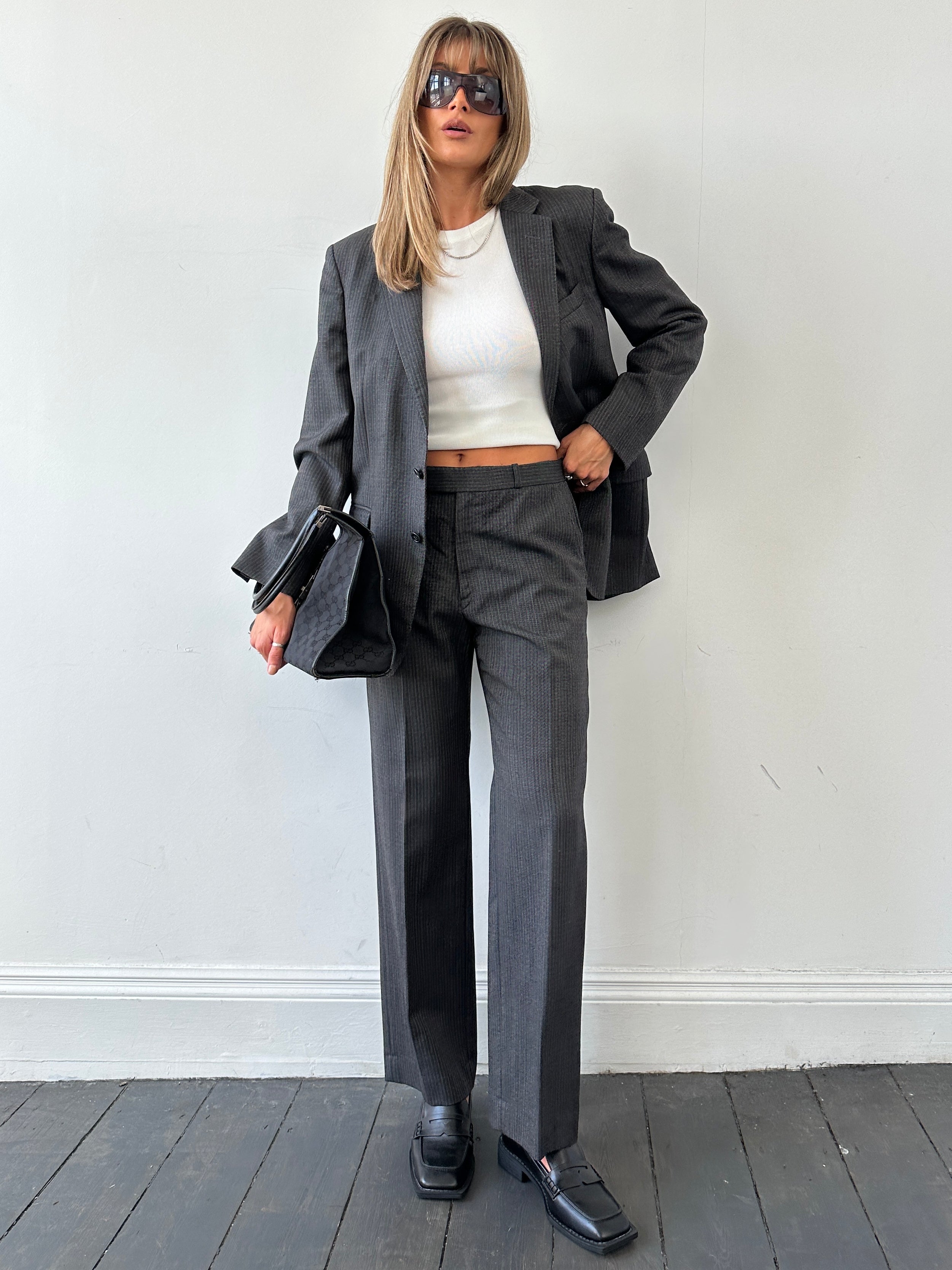 Christian Dior pinstripe single-breasted pure wool suit jumpsuit in 40R/W32, tailored fit with classic pinstripe pattern.