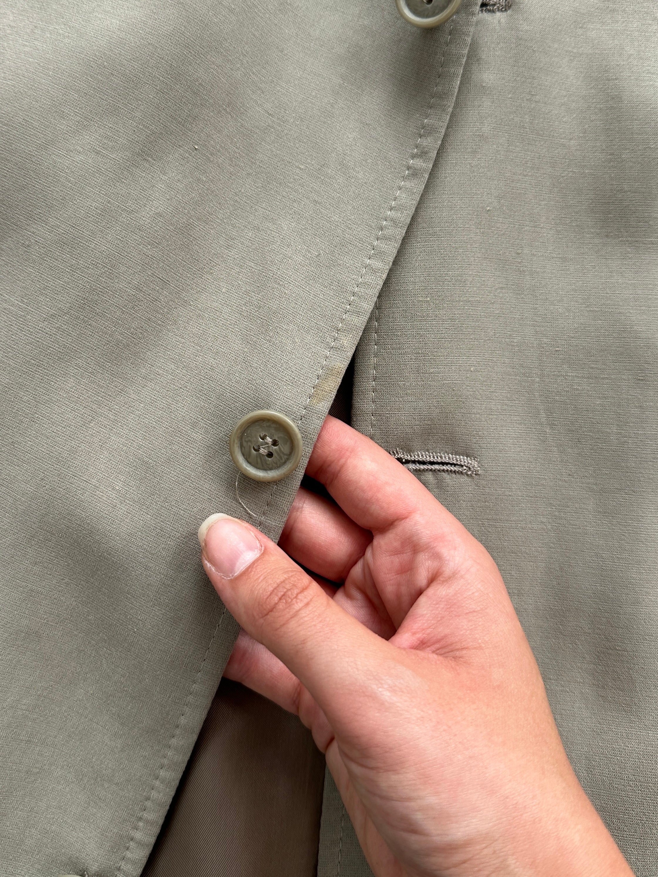 Pierre Cardin lyocell single-breasted jumpsuit in size 42R/W34, shown from front with lapel collar and tailored fit.