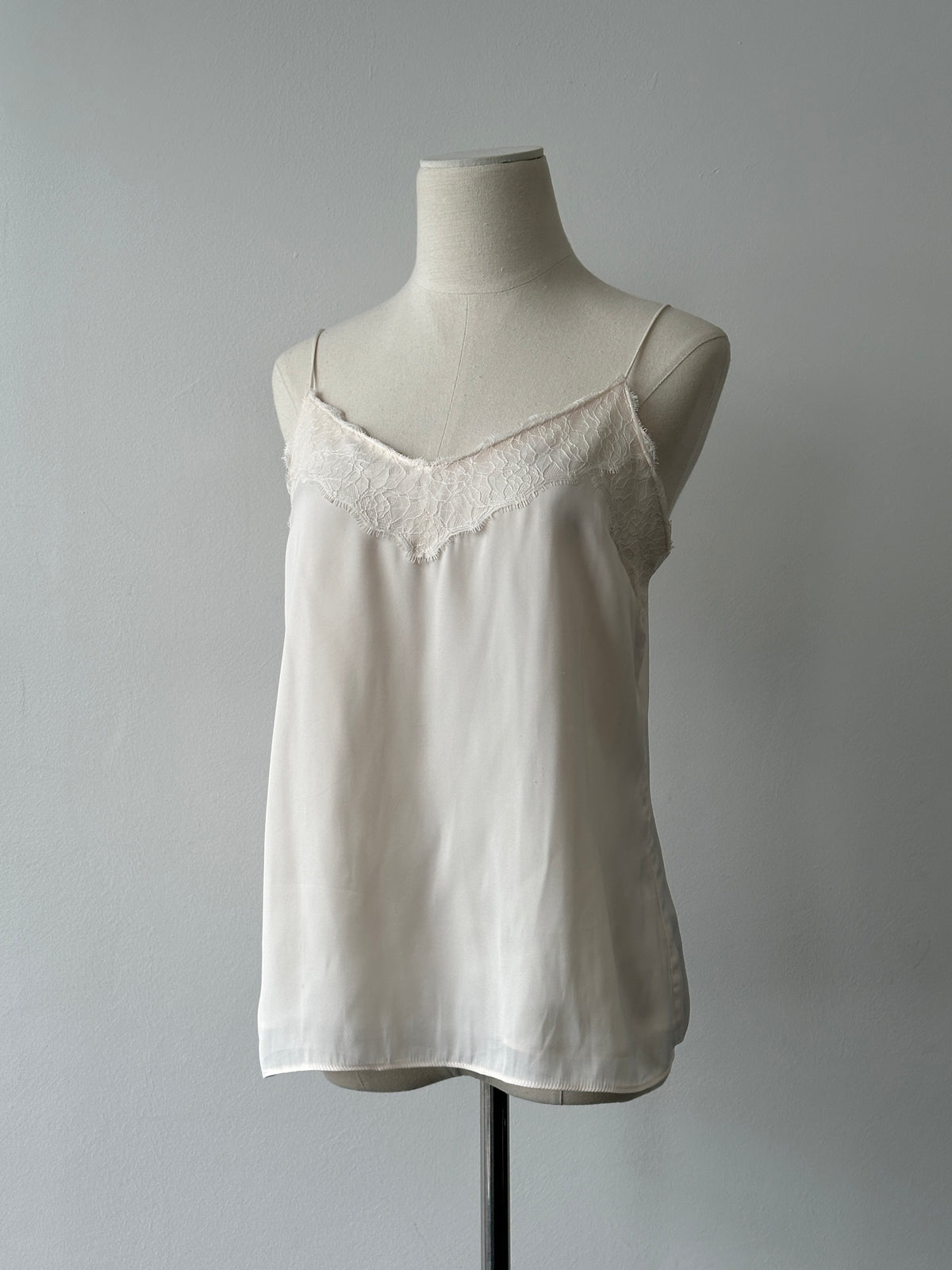 Vintage 2000s satin lace top in size M, featuring delicate lace details and a smooth satin finish, worn style.