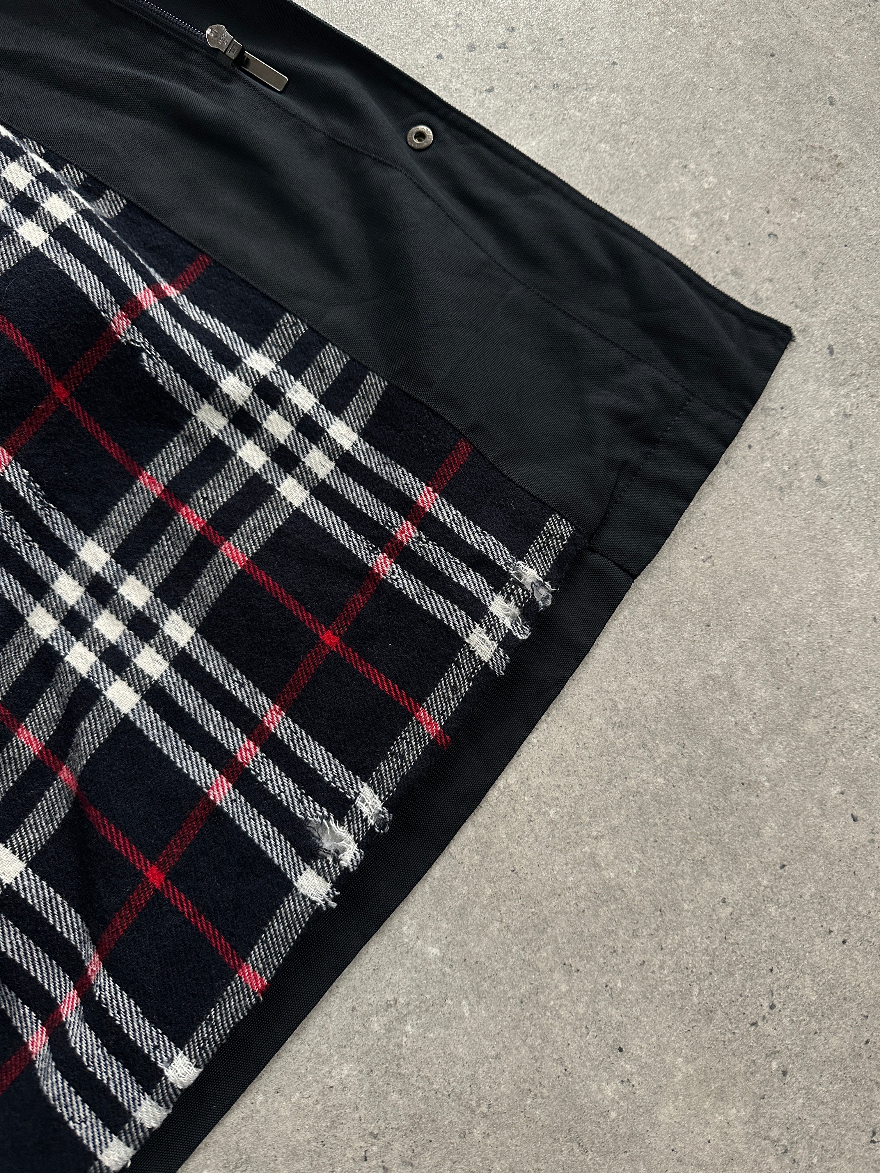 Burberry London 1990s waterproof Nova Check trench coat in XL/XXL, featuring classic tartan pattern and belted design.