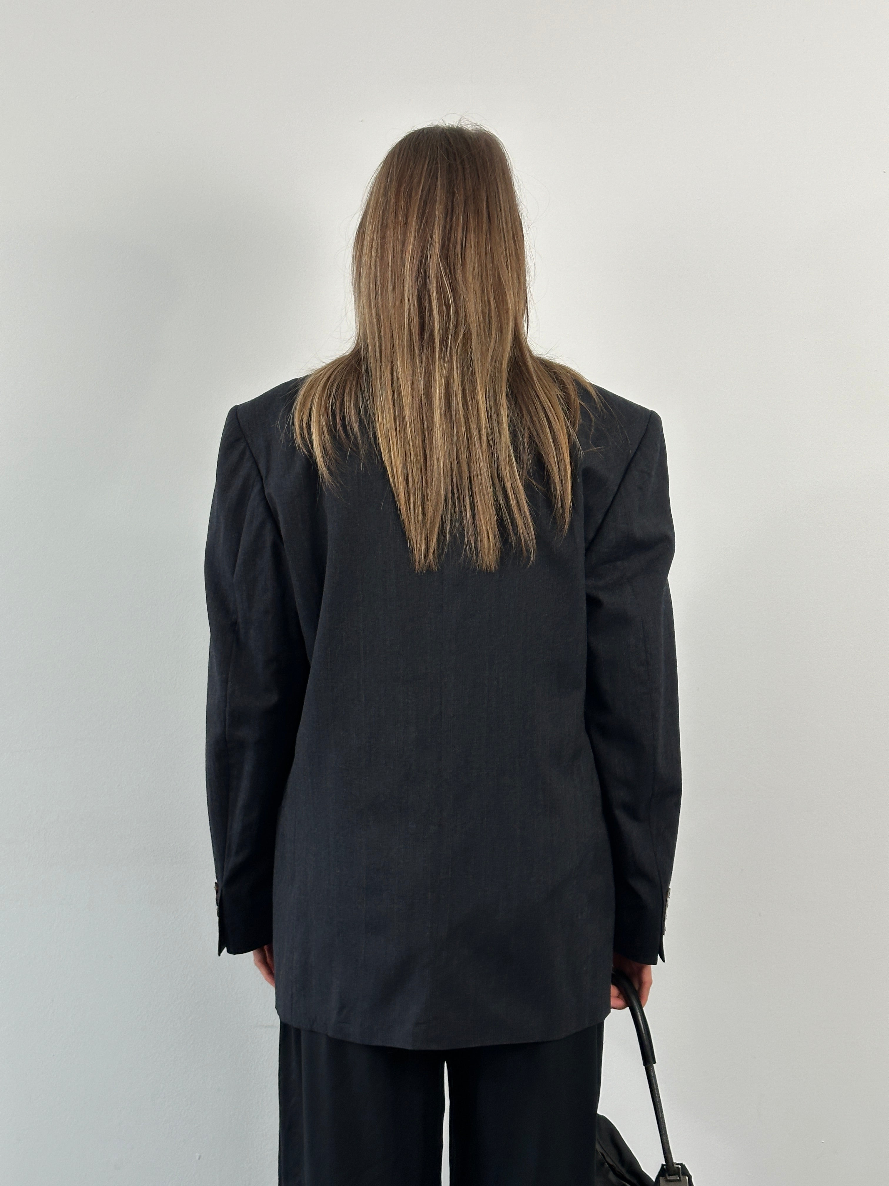 Yves Saint Laurent Pour Homme 1990s pure wool double-breasted blazer in size 42R/XL, navy blue with peak lapels and button details.