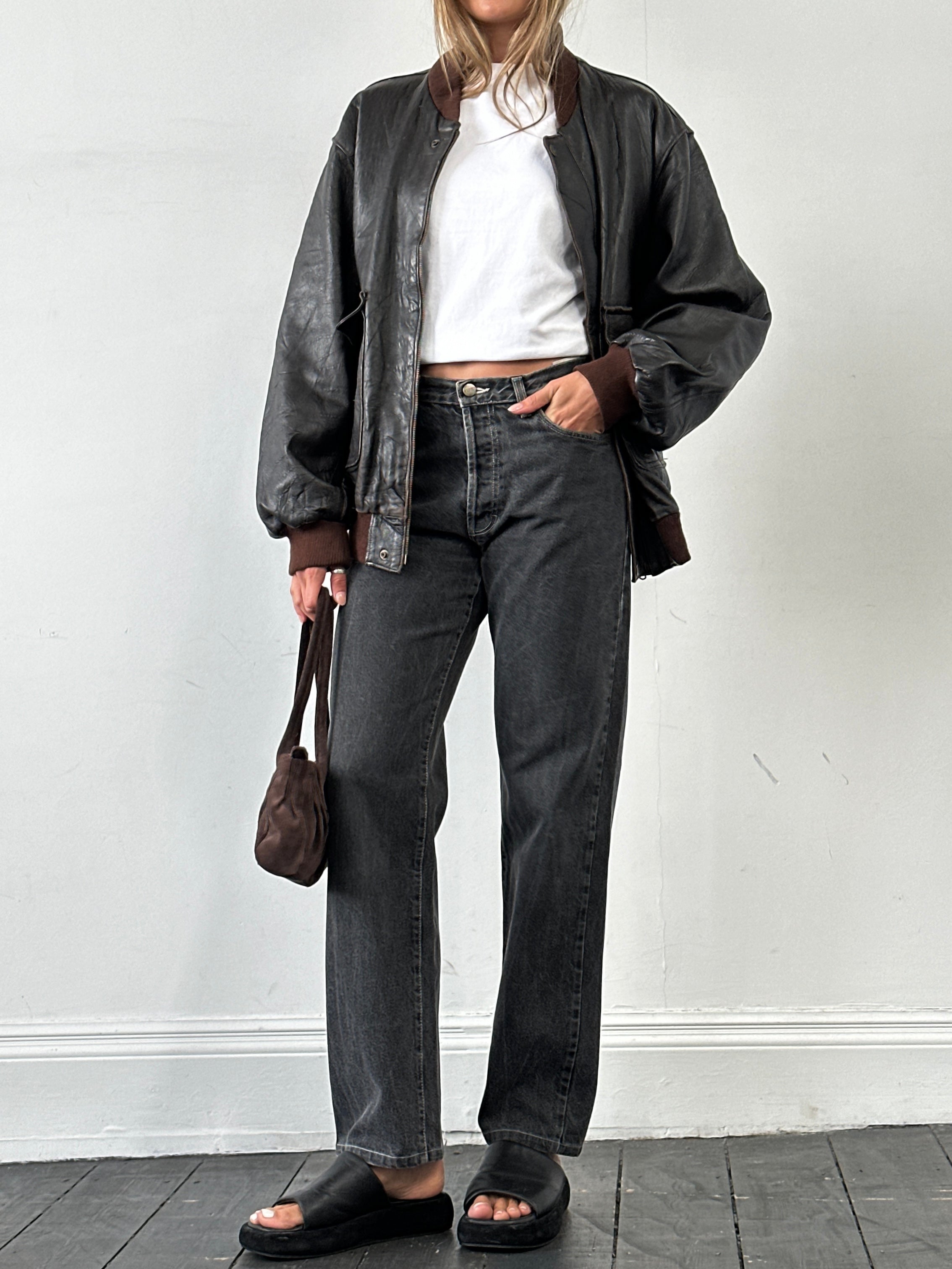 Gianfranco Ferré high-waisted straight leg denim jeans in W30 with classic five-pocket design and light blue wash.