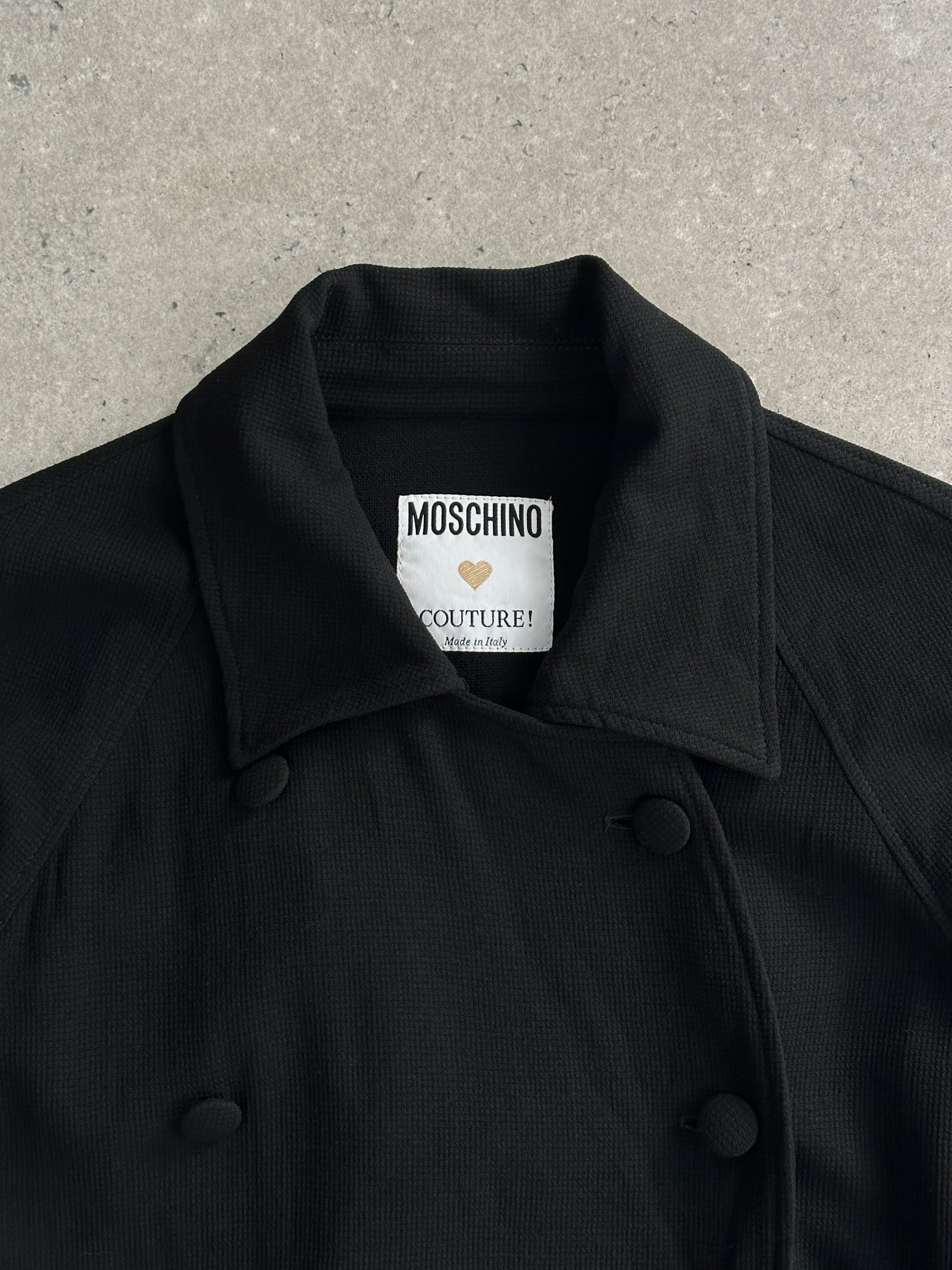 Moschino Couture 1990s pure wool double-breasted curved coat, size L, featuring classic design and stylish tailoring.