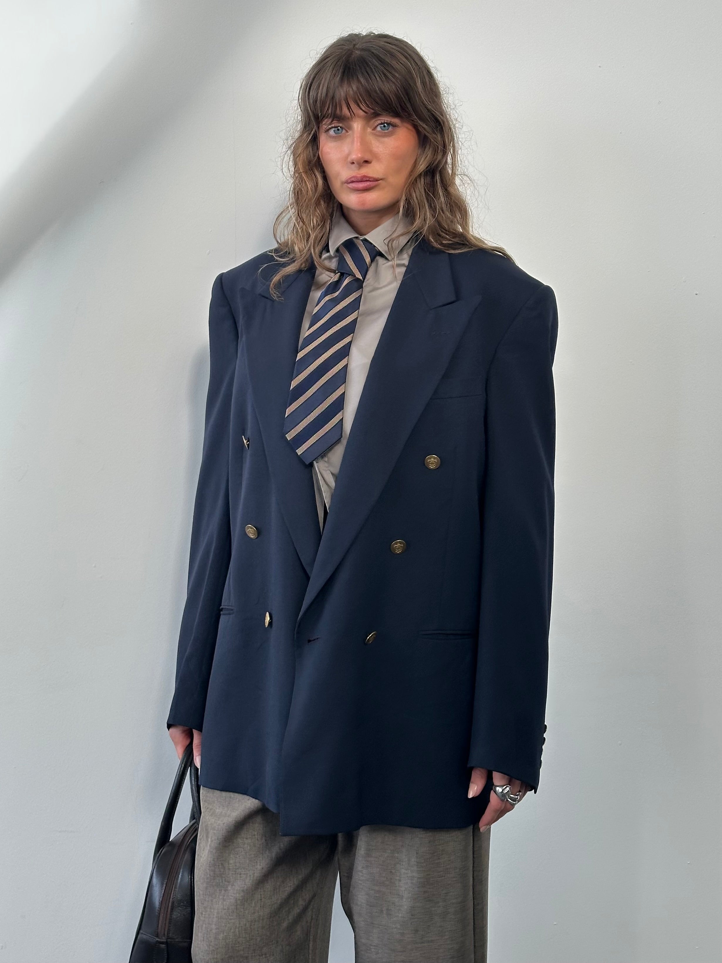 Christian Dior Monsieur 1980s bespoke double-breasted blazer in size 42L/XL, tailored with classic lapels and structured fit.