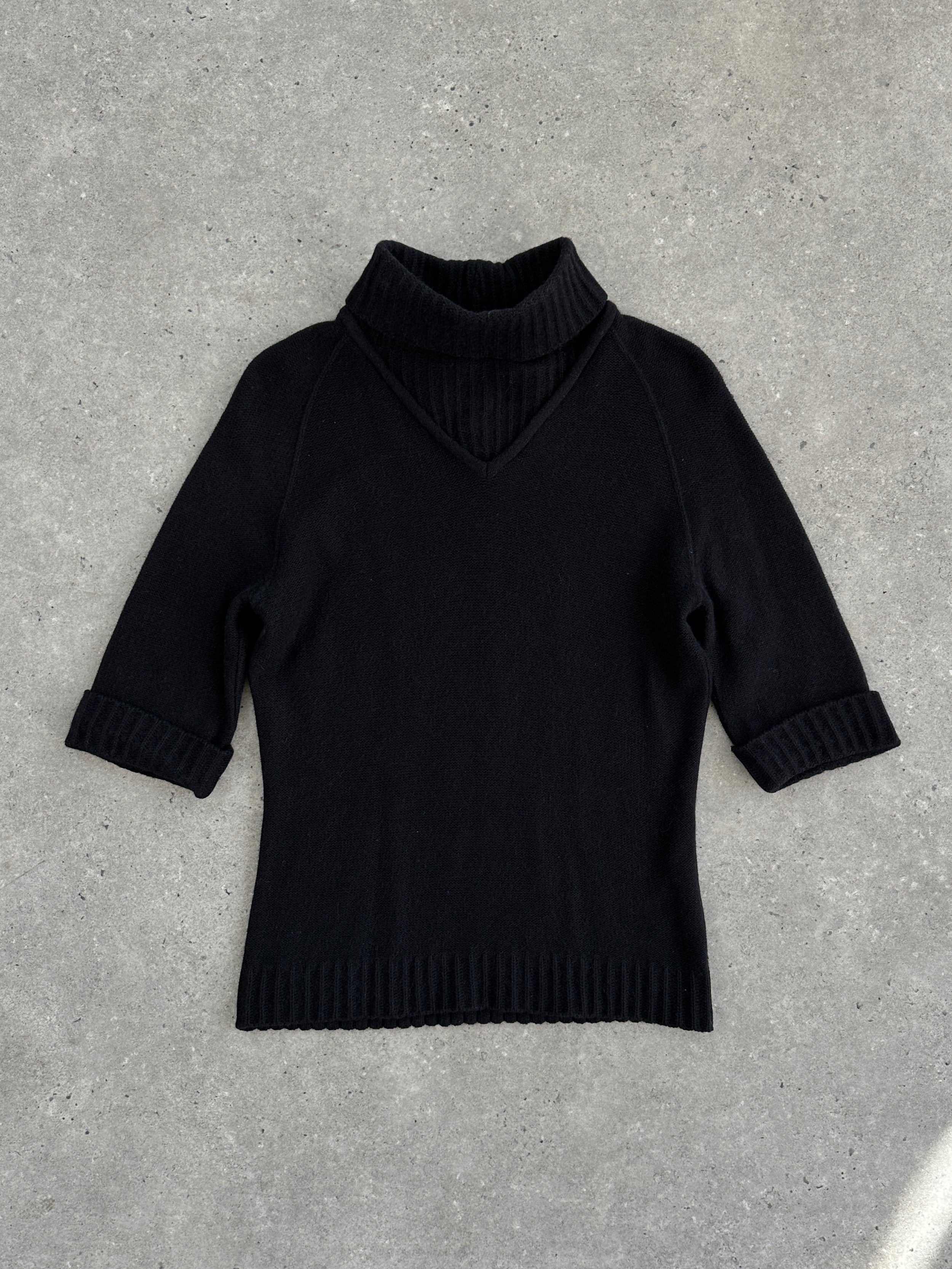 Max Mara Max Max Weekend wool roll neck jumper in size small, featuring a cozy, fitted design in neutral tones.
