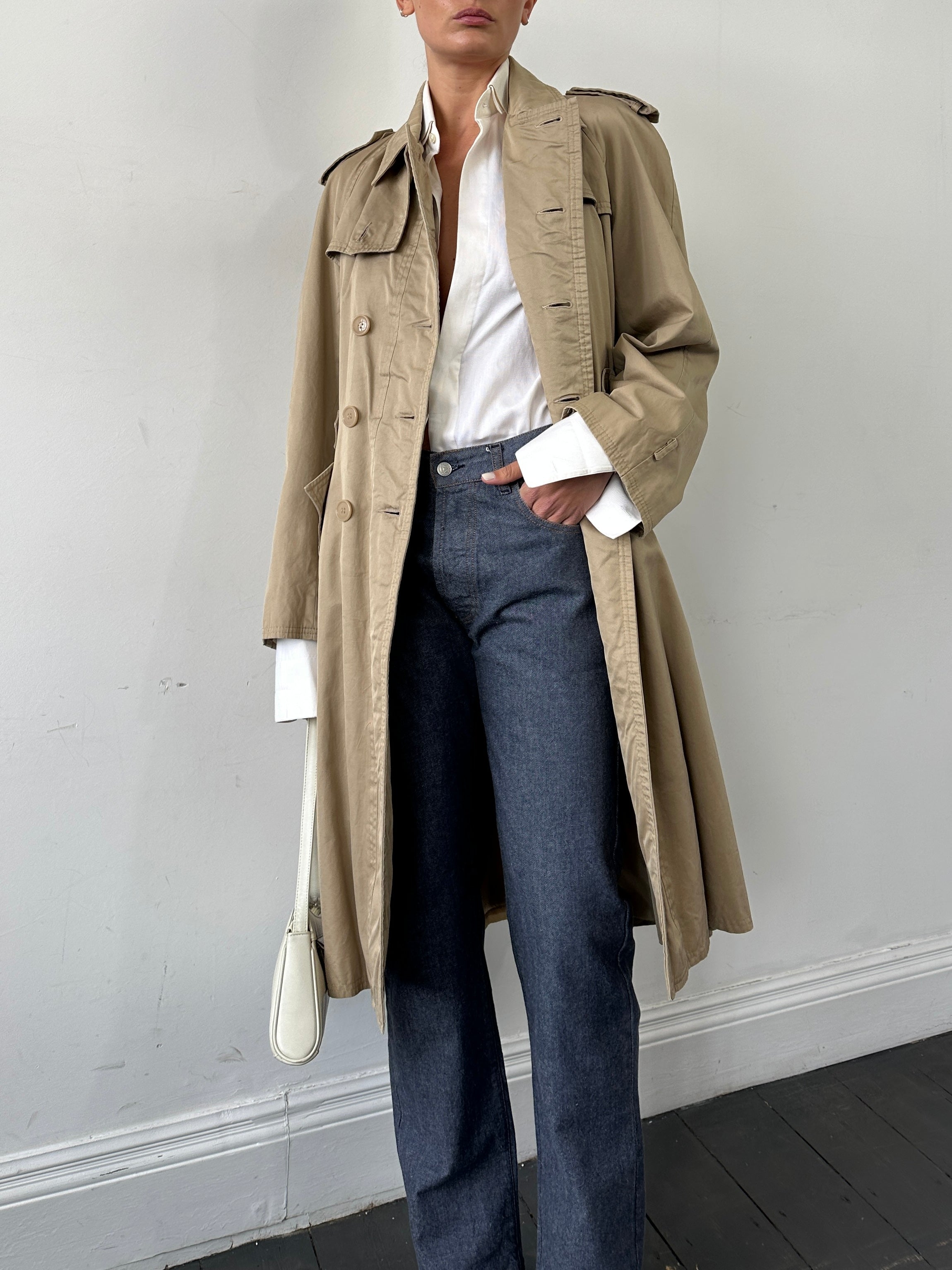 Yves Saint Laurent pure cotton double-breasted trench coat in size M, beige color, with classic collar and belted waist.