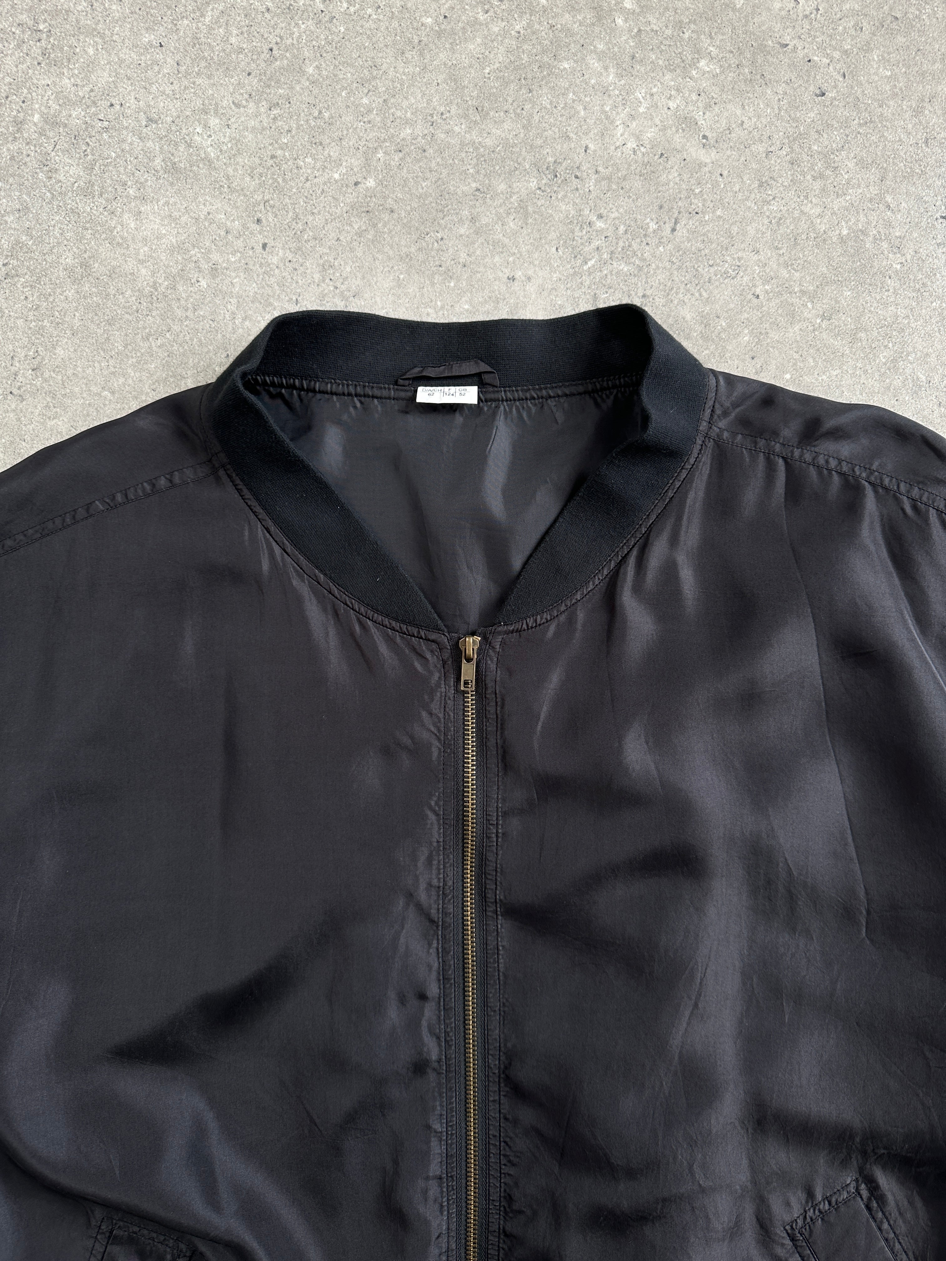 Vintage 1990s pure silk bomber jacket in XXXL size, showcasing a classic retro style with a smooth silk finish.