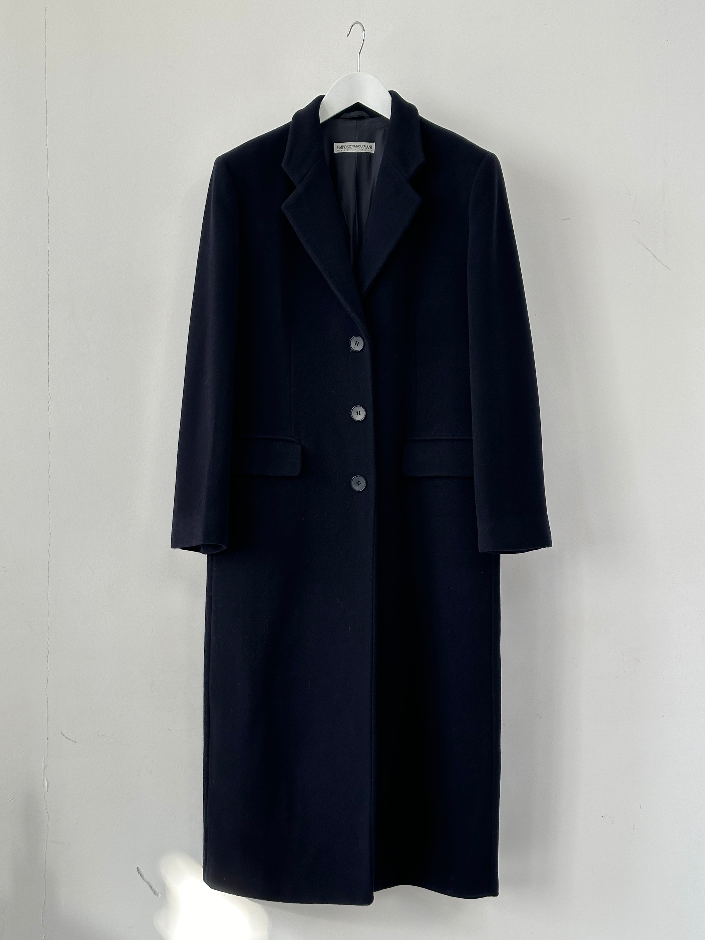 Emporio Armani pure wool single-breasted coat in size M, stylish and tailored, displayed on a hanger.