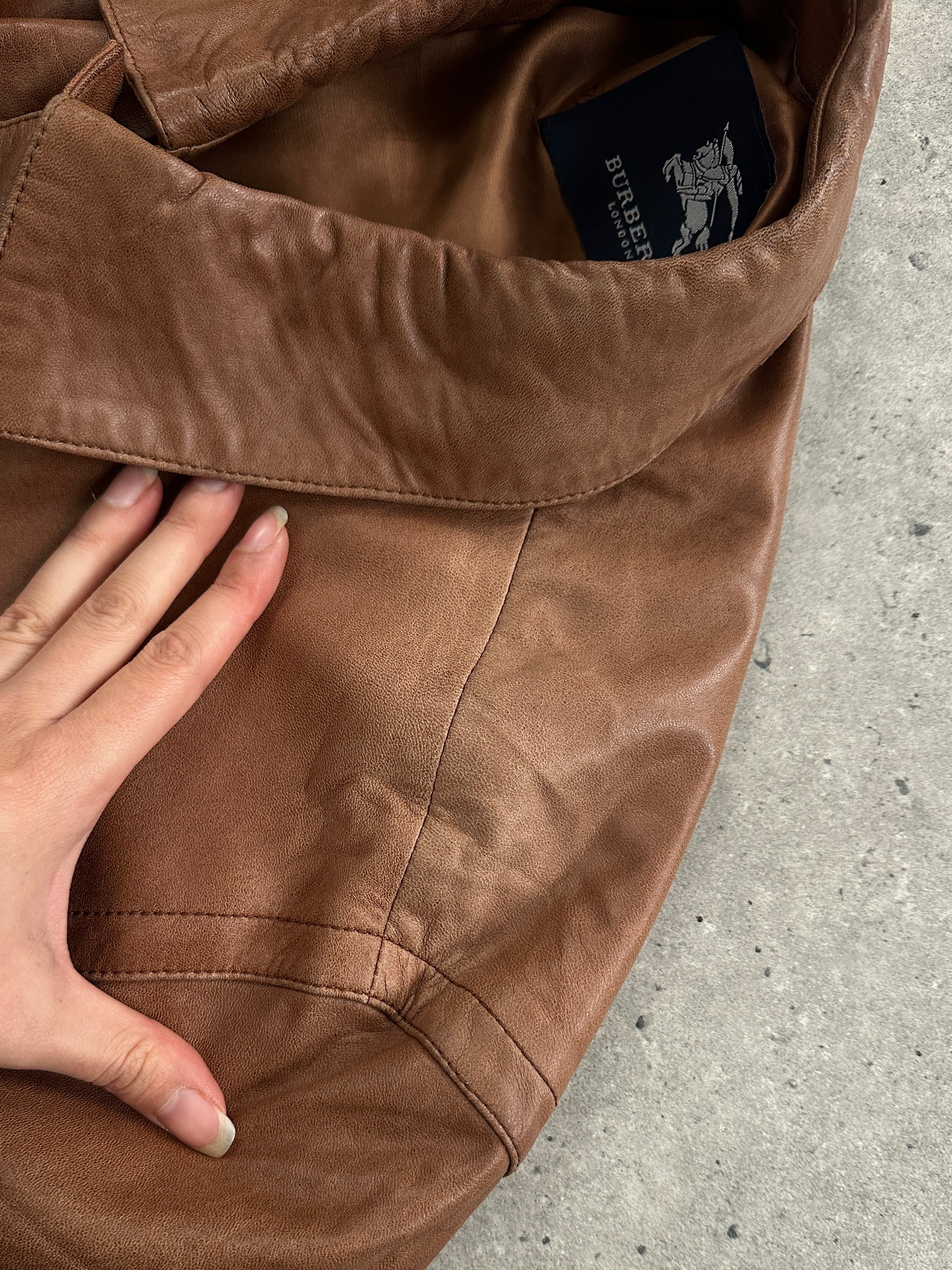 Burberry London 2000s aged smooth leather jacket in XL, featuring classic design and detailed stitching.