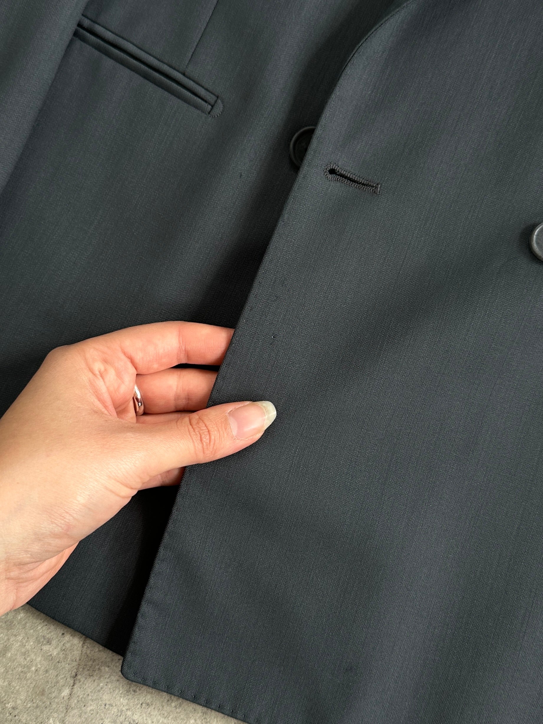 Vintage Italian pure wool double-breasted blazer in size 40R/W28, classic tailored suit jacket with elegant lapels and detailed stitching.