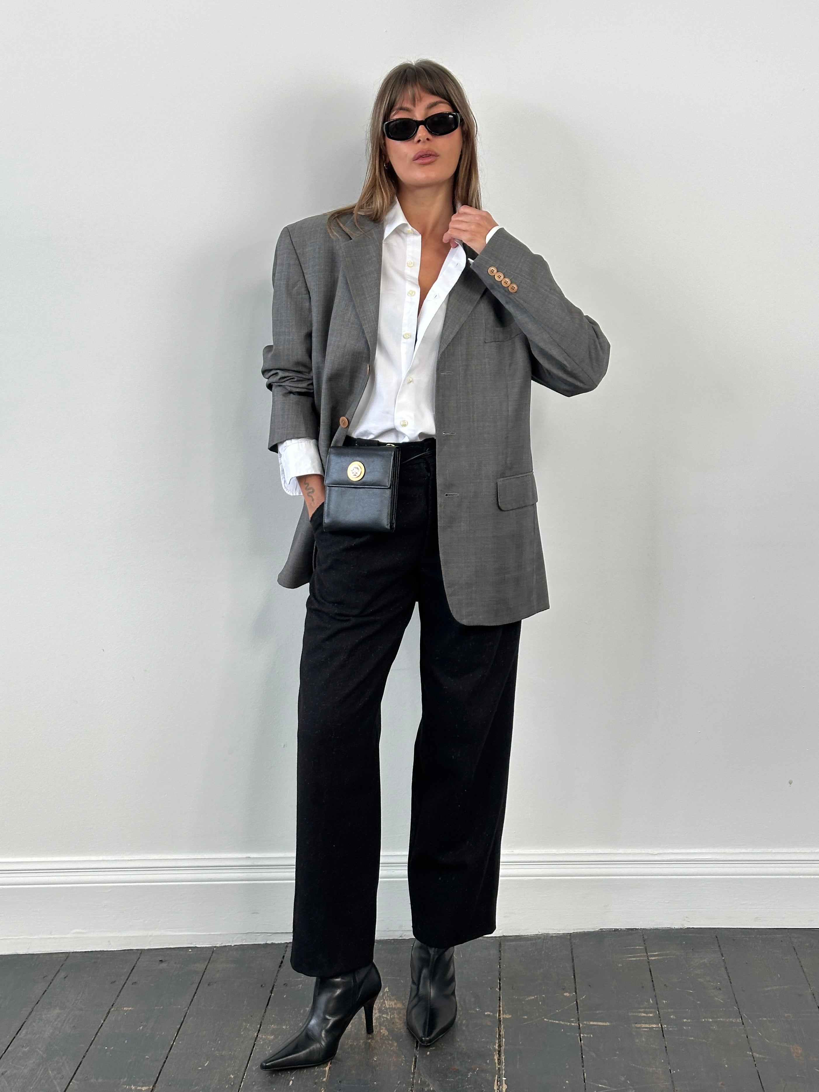 Yves Saint Laurent Pour Homme 1990s pure wool single-breasted blazer, size 40R/L, in classic style with lapel collar and tailored fit.