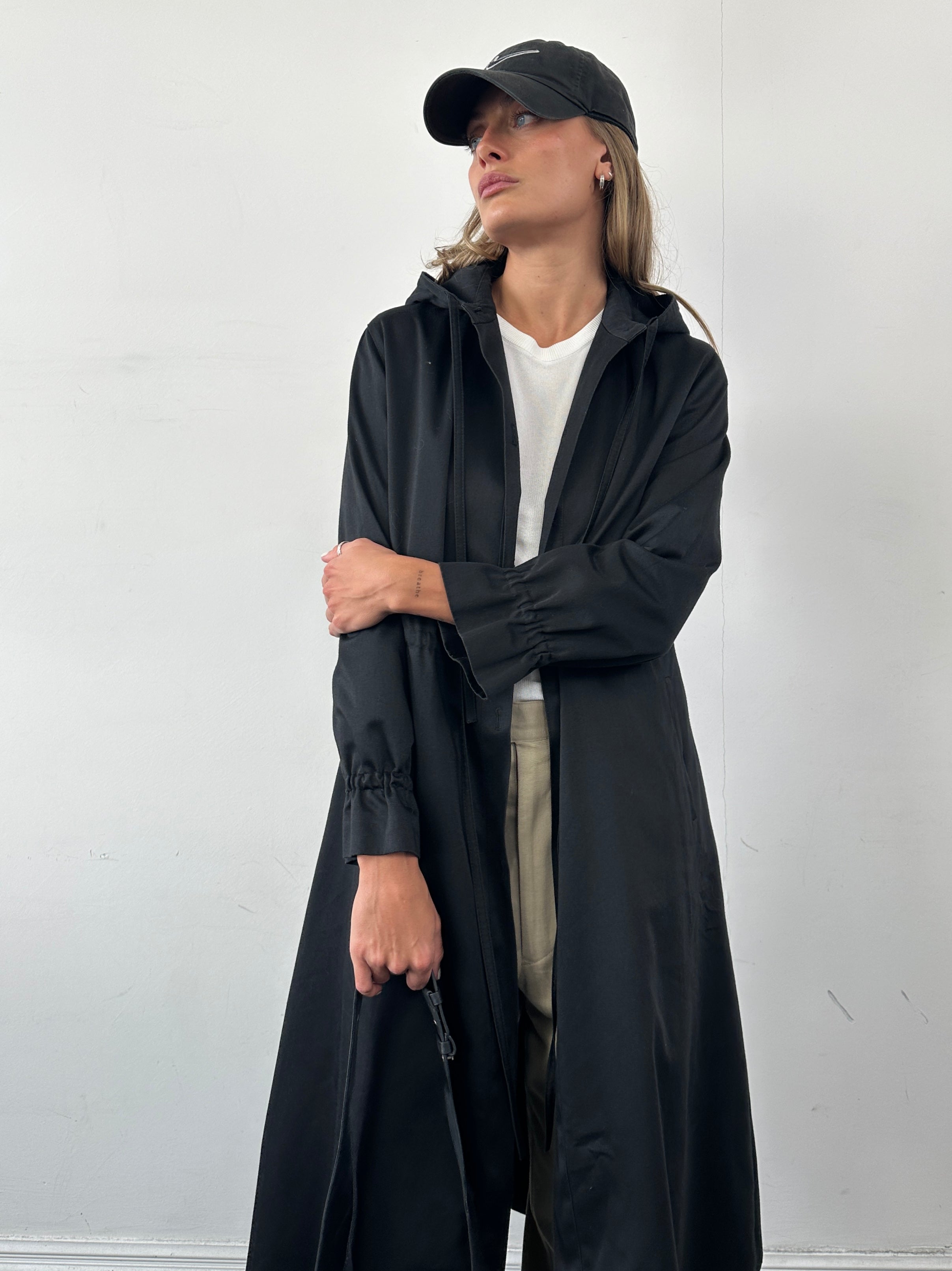 Vintage cotton tie waist hooded trench coat in size small, featuring classic design and versatile style.