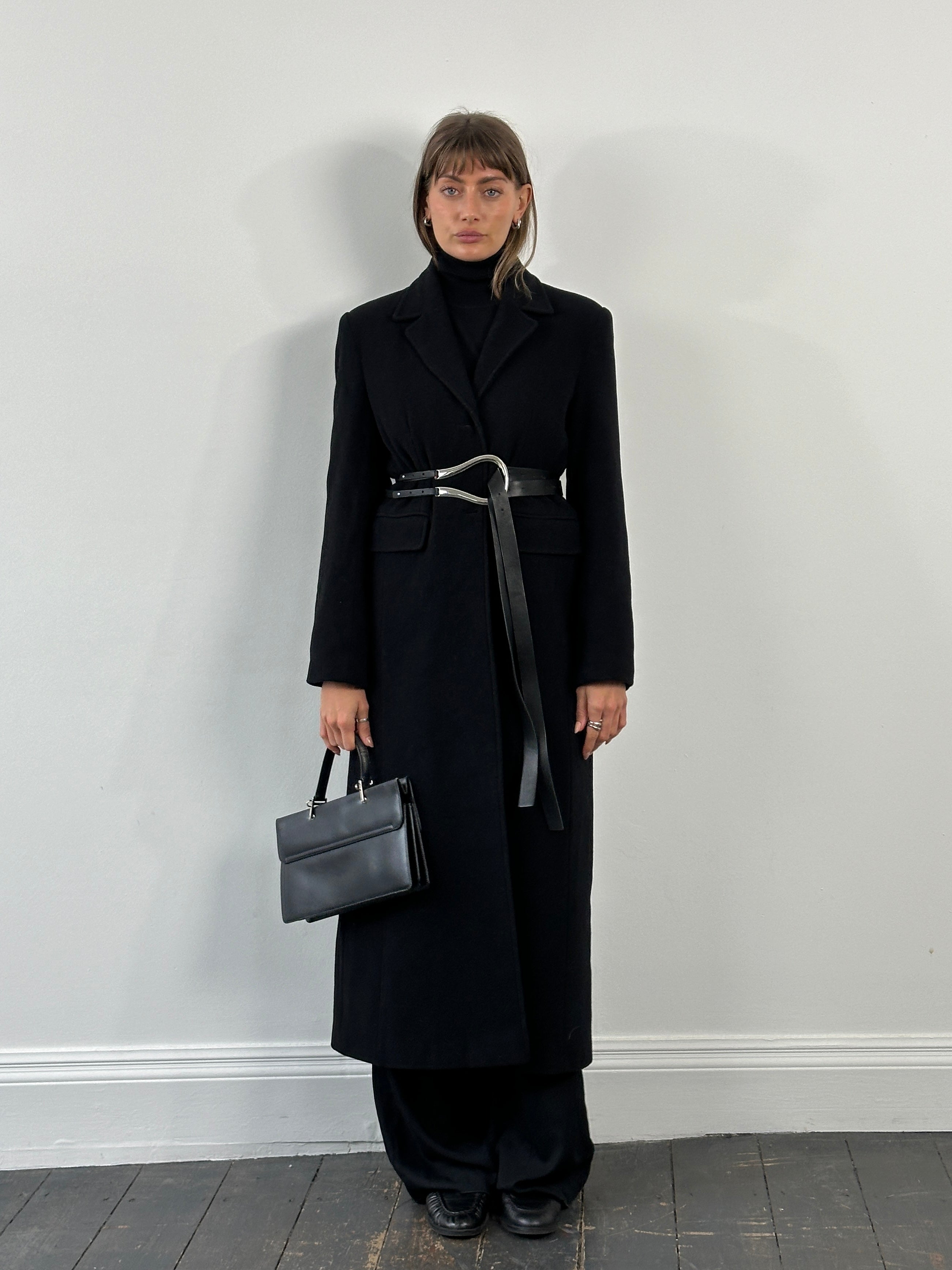 Vintage 1990s wool floor-length coat in size S/M, classic retro style with tailored fit and warm, textured fabric.